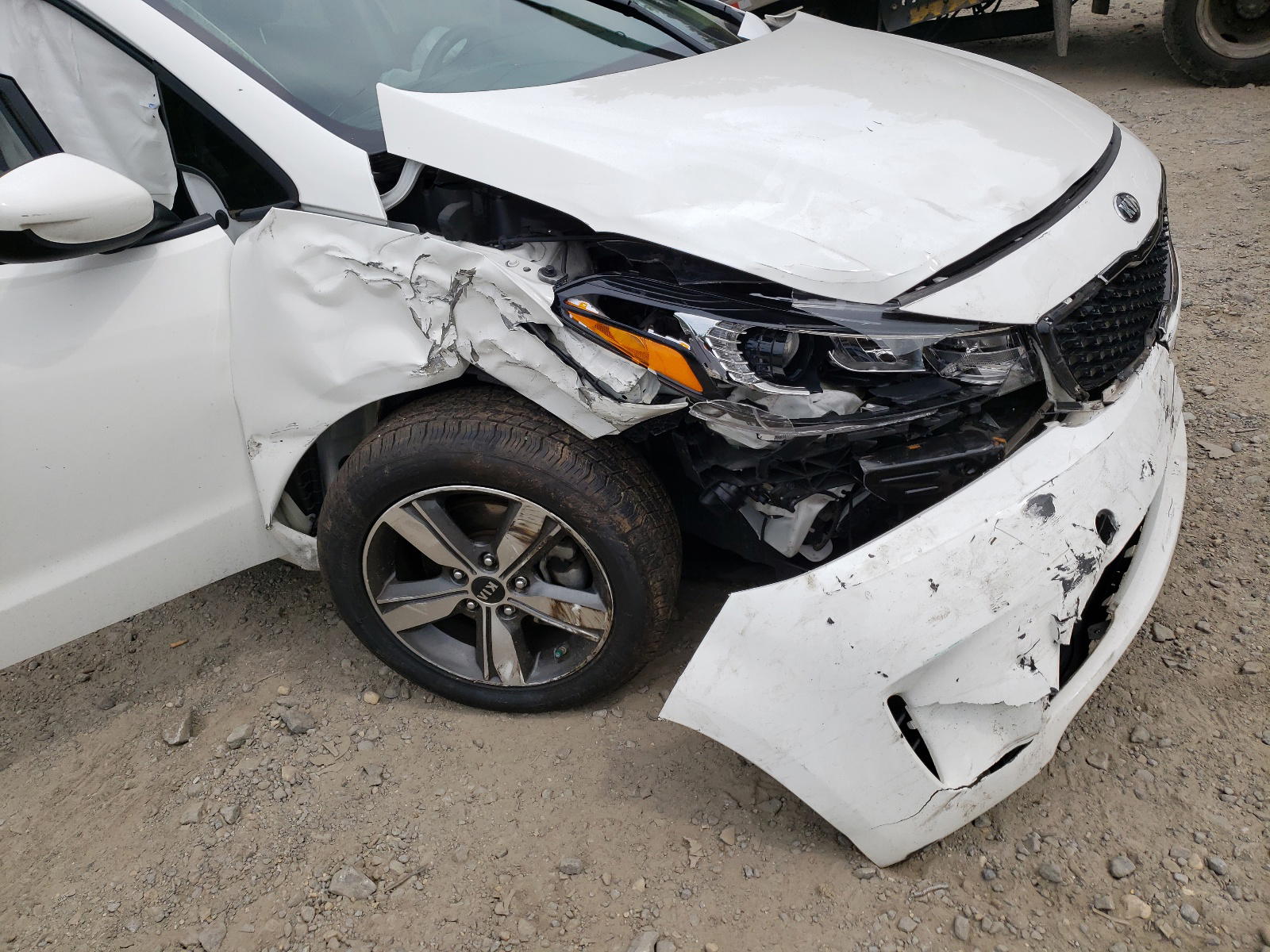 Photo 9 from auction – 2018 KIA FORTE LX with VIN 3KPFL4A74JE246790