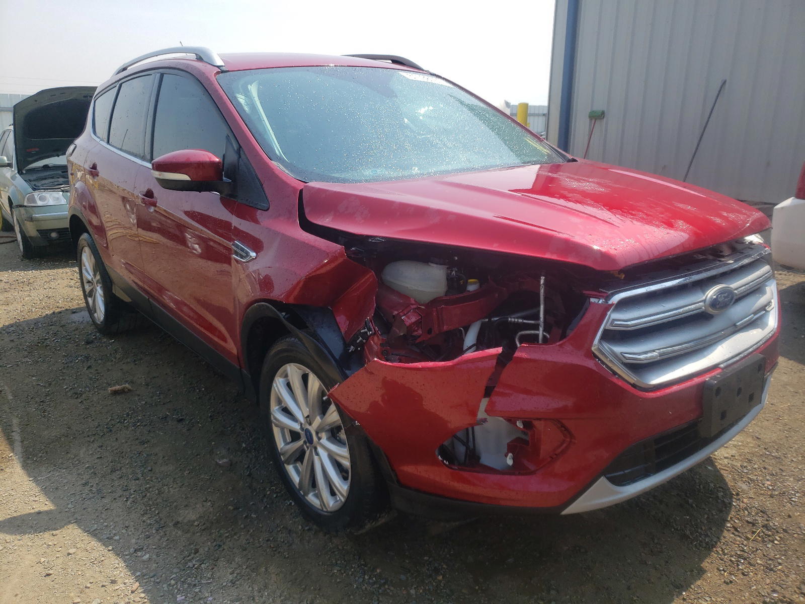 FORD ESCAPE TIT 2017 with VIN 1FMCU0J99HUD12347 - Photo from auction