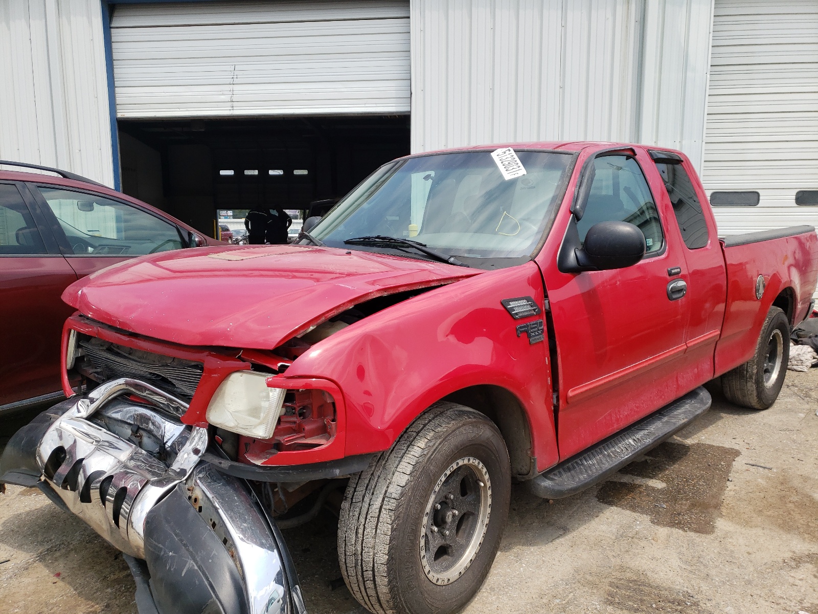 Photo 2 from auction – 2004 FORD F-150 HERI with VIN 2FTRX17W94CA13301