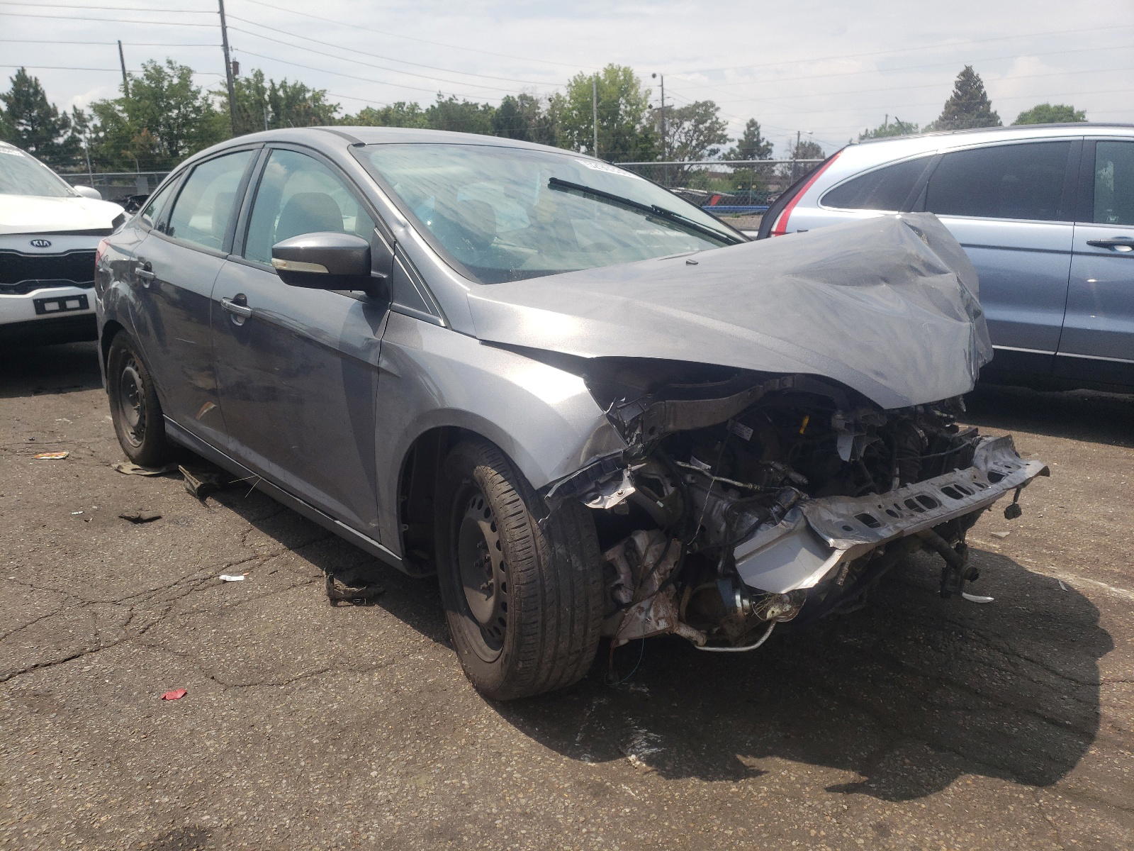 FORD FOCUS SE 2014 with VIN 1FADP3F24EL351352 - Photo from auction