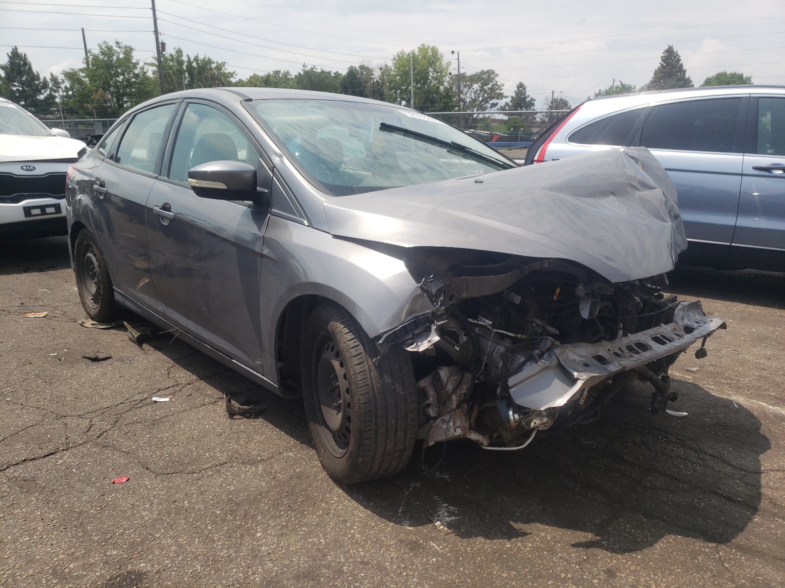 Zdjęcie 1 z aukcji – 2014 FORD FOCUS SE z VIN 1FADP3F24EL351352