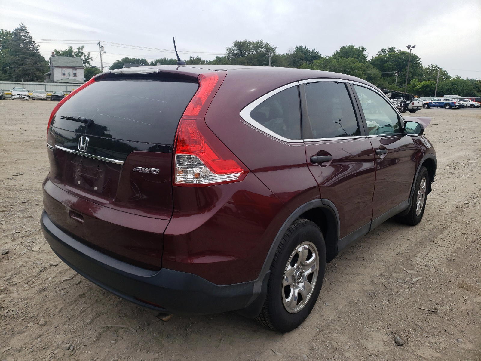 Photo 4 from auction – 2012 HONDA CR-V LX with VIN 5J6RM4H30CL061007