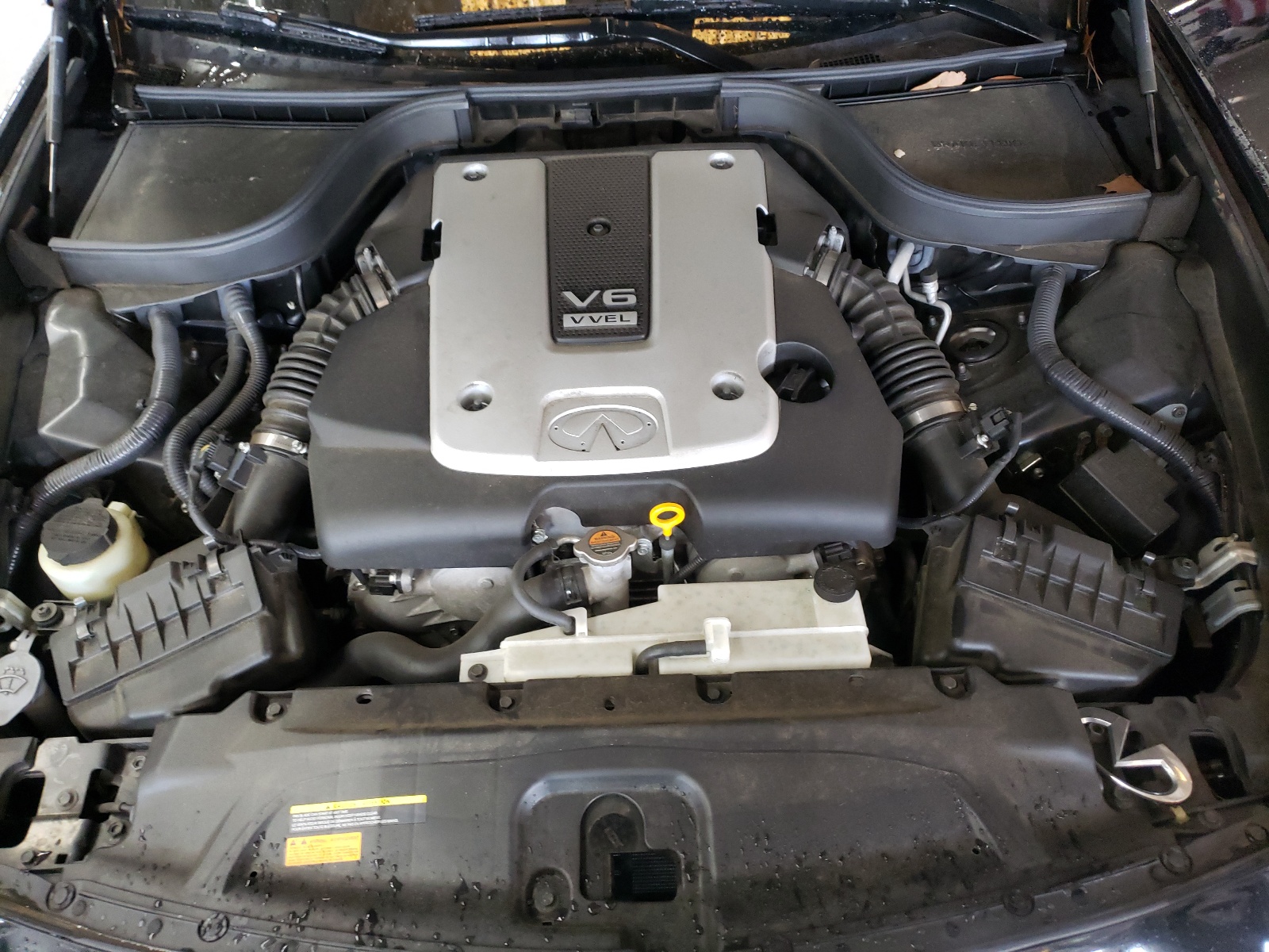 Photo 7 from auction – 2015 INFINITI Q40 with VIN JN1CV6AP3FM502213