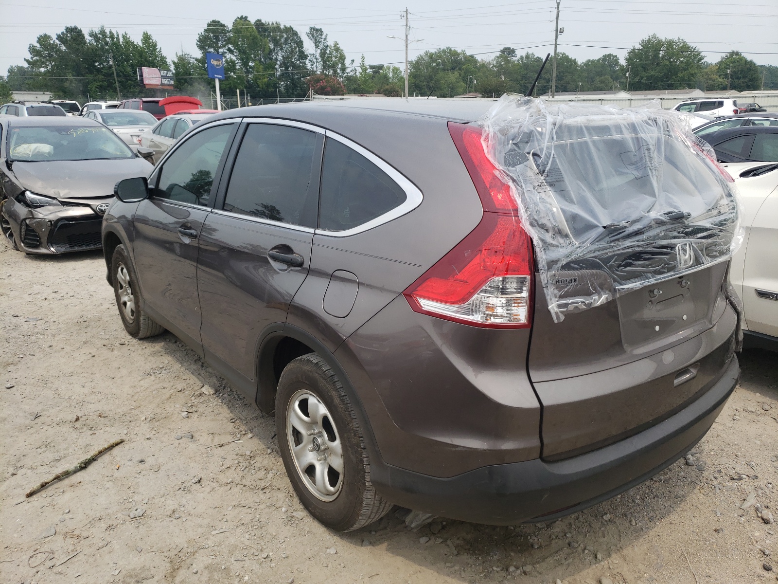 Photo 3 from auction – 2014 HONDA CR-V LX with VIN 2HKRM3H33EH518318