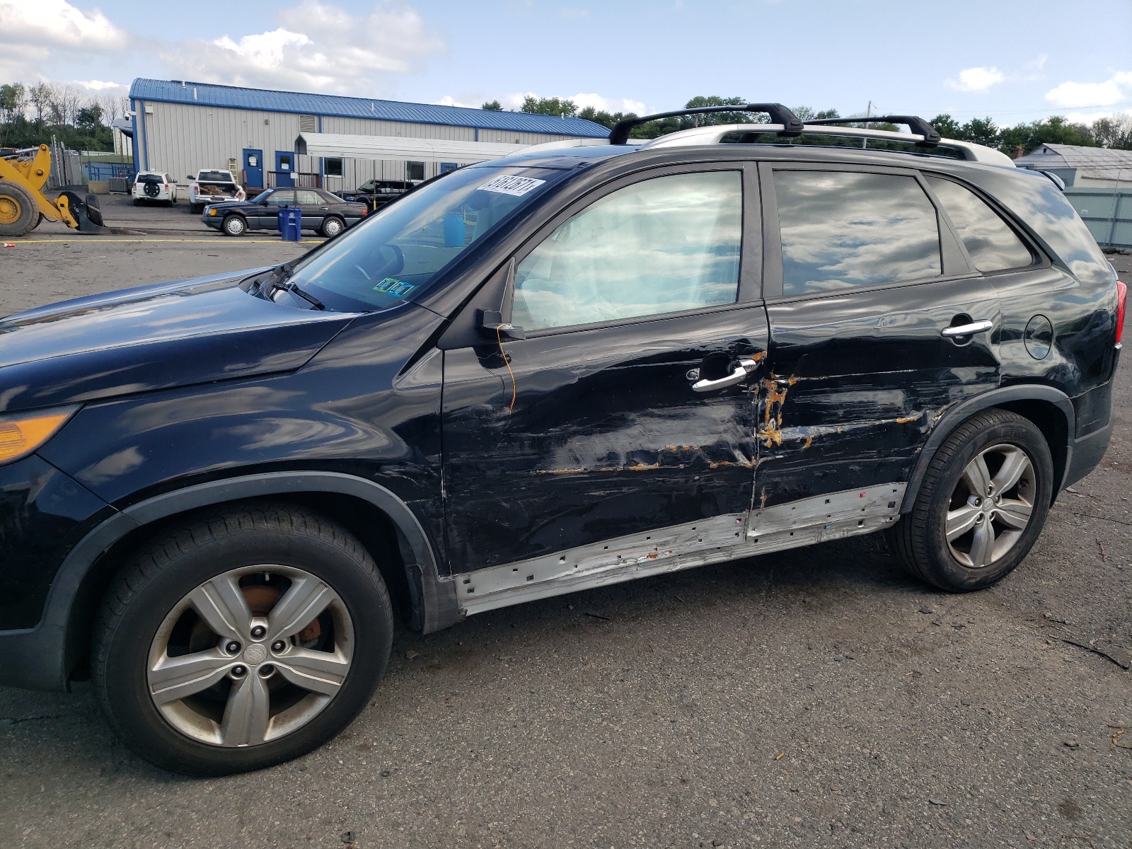 Photo 9 from auction – 2013 KIA SORENTO EX with VIN 5XYKUDA24DG325108