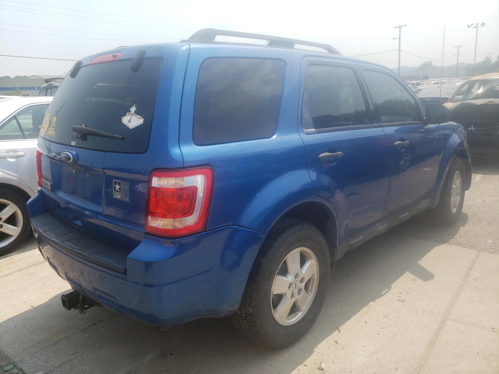 Photo 4 from auction – 2011 FORD ESCAPE XLT with VIN 1FMCU0D70BKA05856