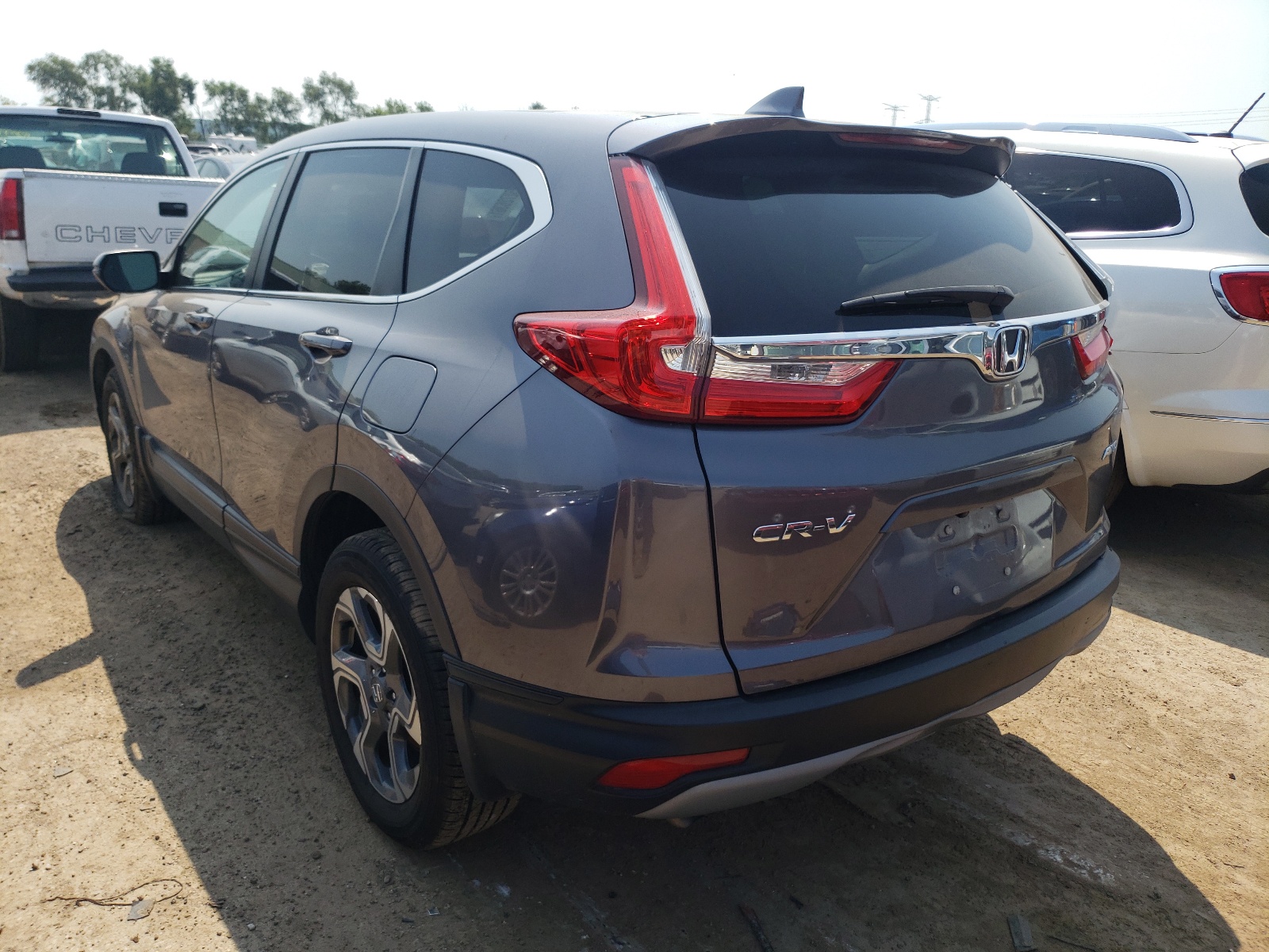 Photo 3 from auction – 2017 HONDA CR-V EXL with VIN 5J6RW2H87HL044304