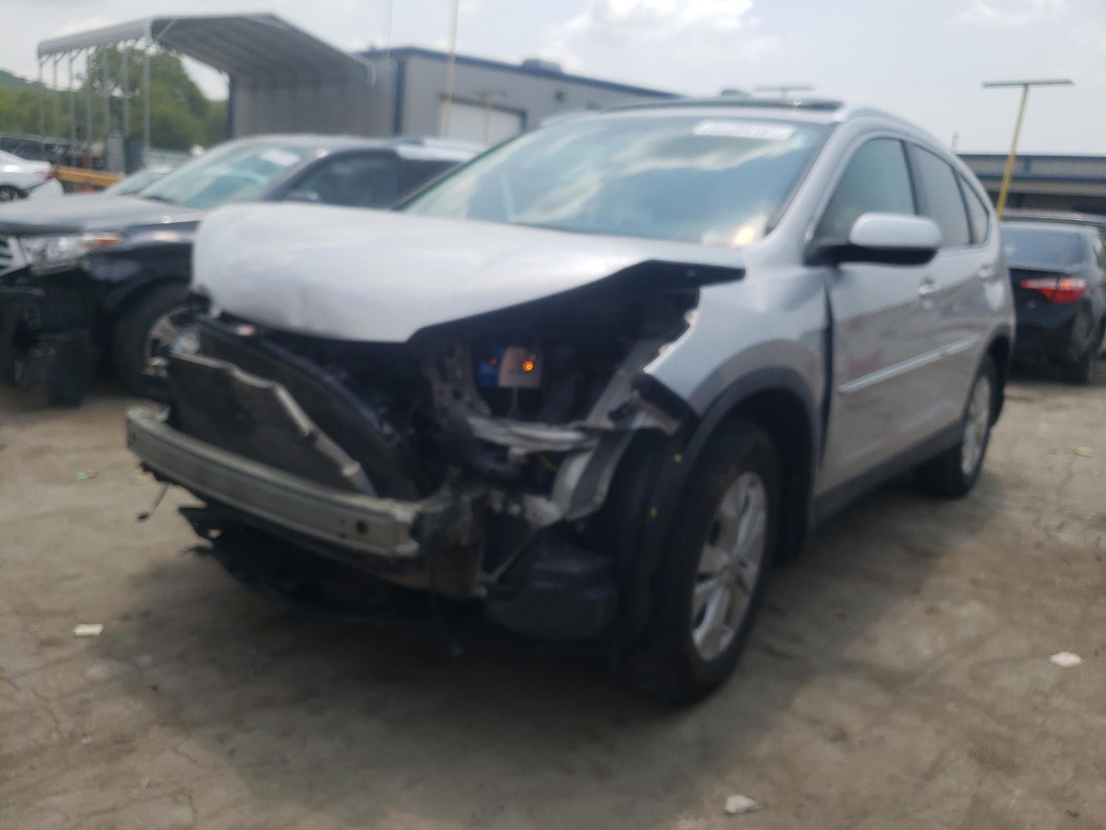 Photo 2 from auction – 2012 HONDA CR-V EXL with VIN 5J6RM4H75CL015269