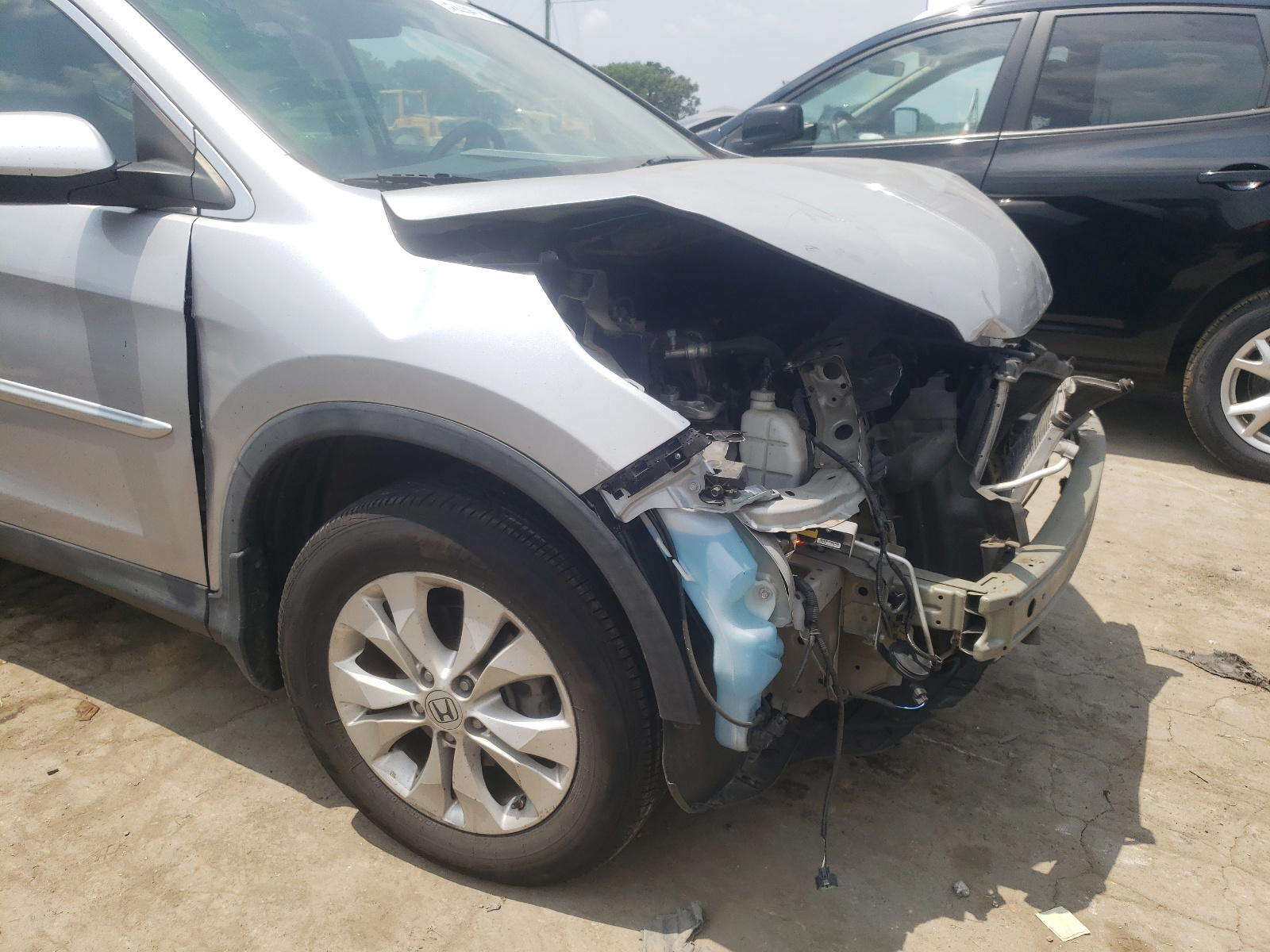Photo 9 from auction – 2012 HONDA CR-V EXL with VIN 5J6RM4H75CL015269