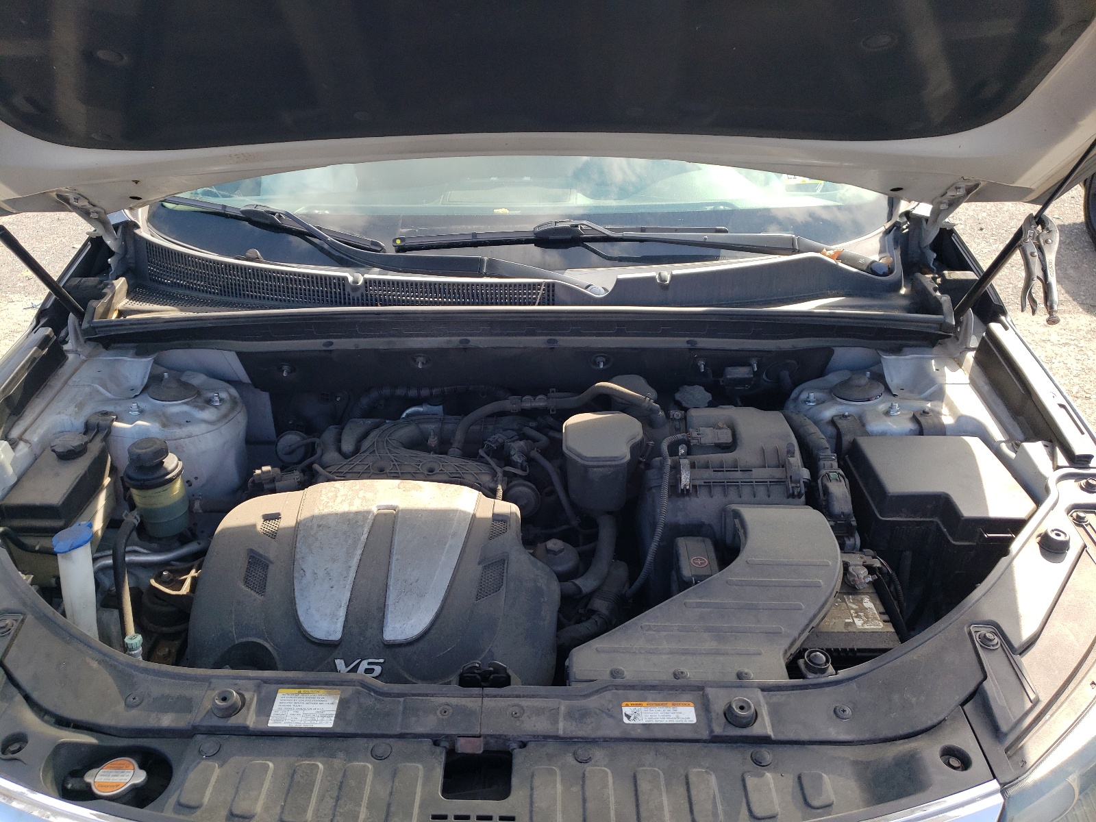Photo 7 from auction – 2013 KIA SORENTO EX with VIN 5XYKUDA24DG325108