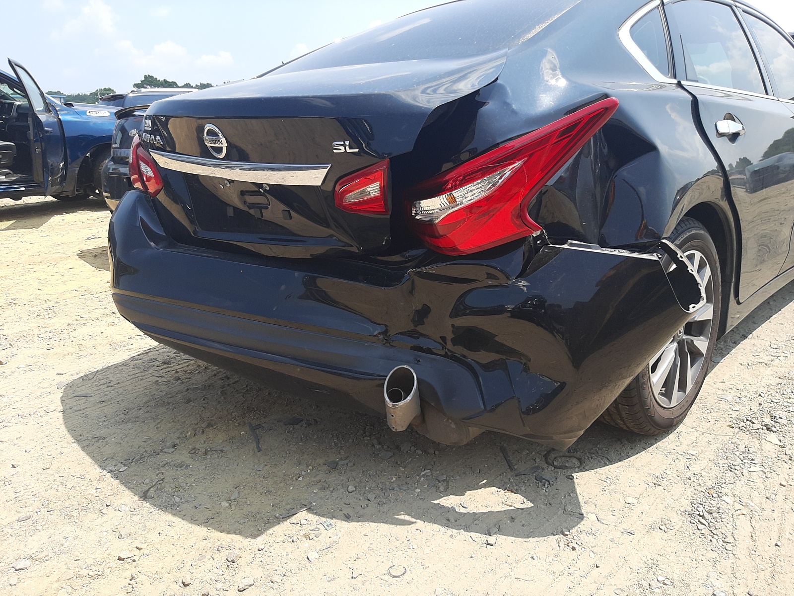 Photo 9 from auction – 2016 NISSAN ALTIMA 2.5 with VIN 1N4AL3AP7GC259124