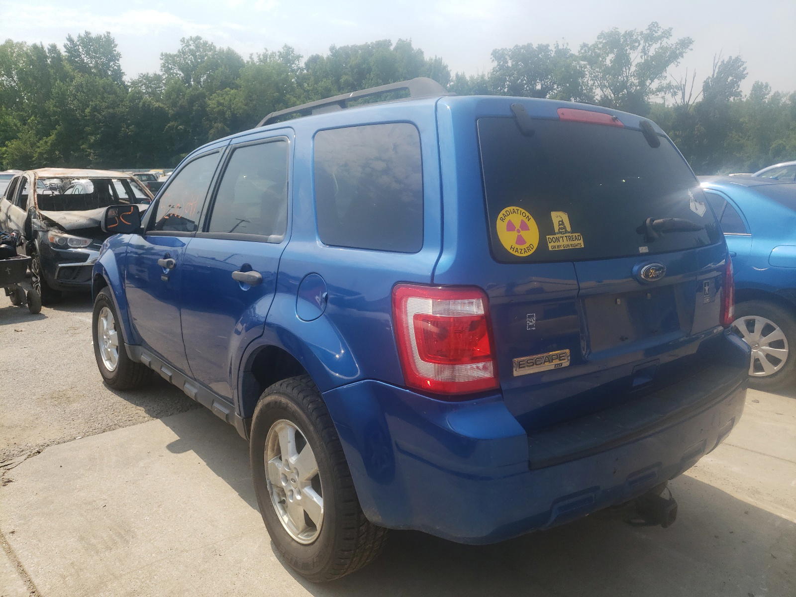 Photo 3 from auction – 2011 FORD ESCAPE XLT with VIN 1FMCU0D70BKA05856