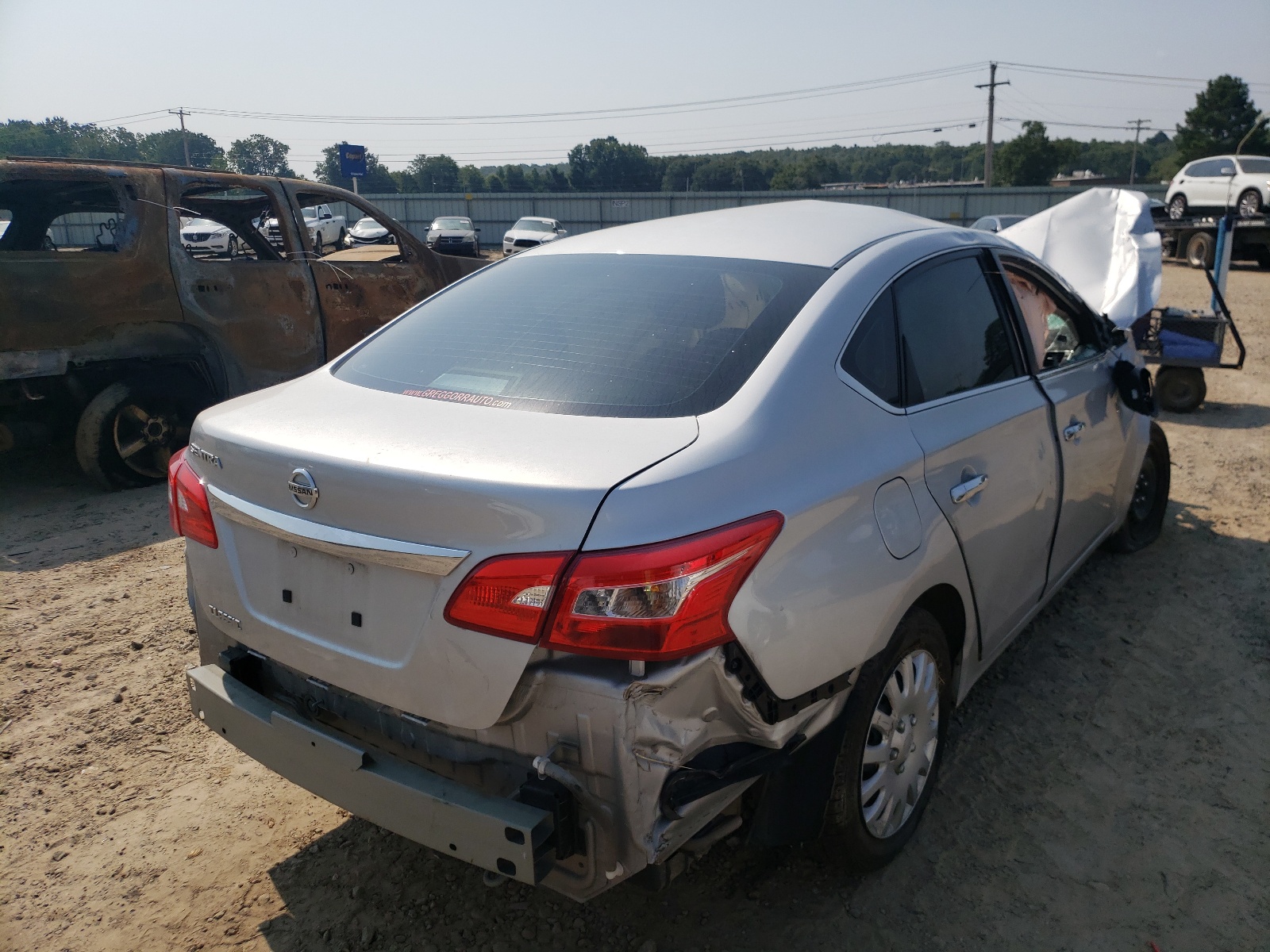 Photo 4 from auction – 2018 NISSAN SENTRA S with VIN 3N1AB7AP1JY283358