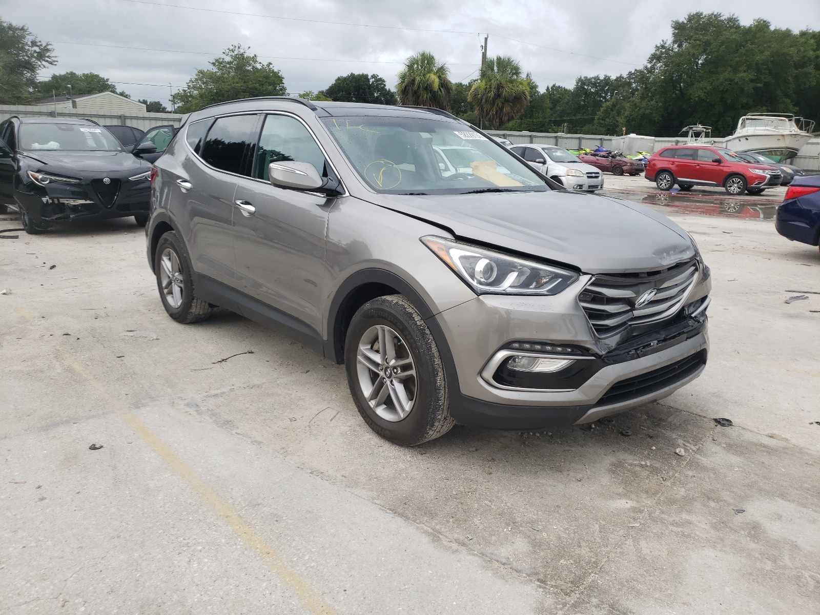 HYUNDAI SANTA FE S 2017 with VIN 5NMZU3LB6HH041657 - Photo from auction