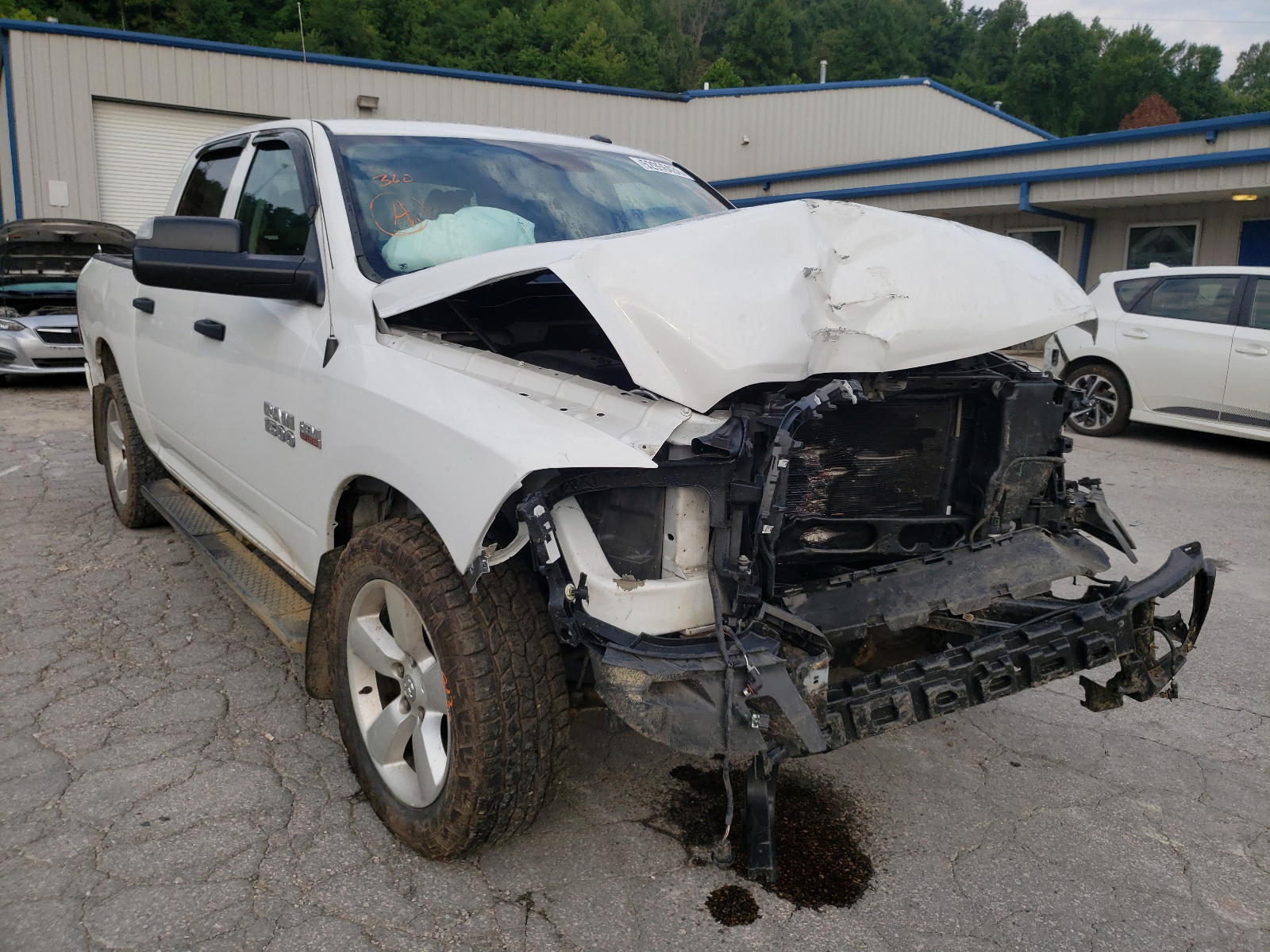 RAM 1500 ST 2014 with VIN 3C6RR7KTXEG324810 - Photo from auction