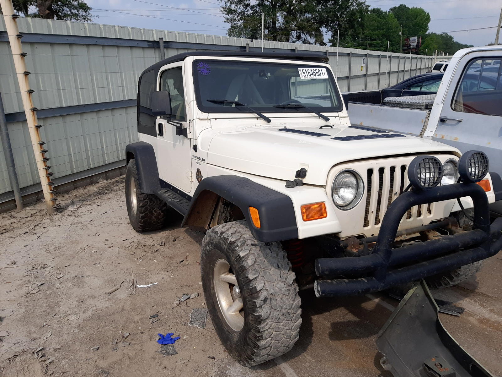 JEEP WRANGLER / 2000 with VIN 1J4FA59S2YP711298 - Photo from auction
