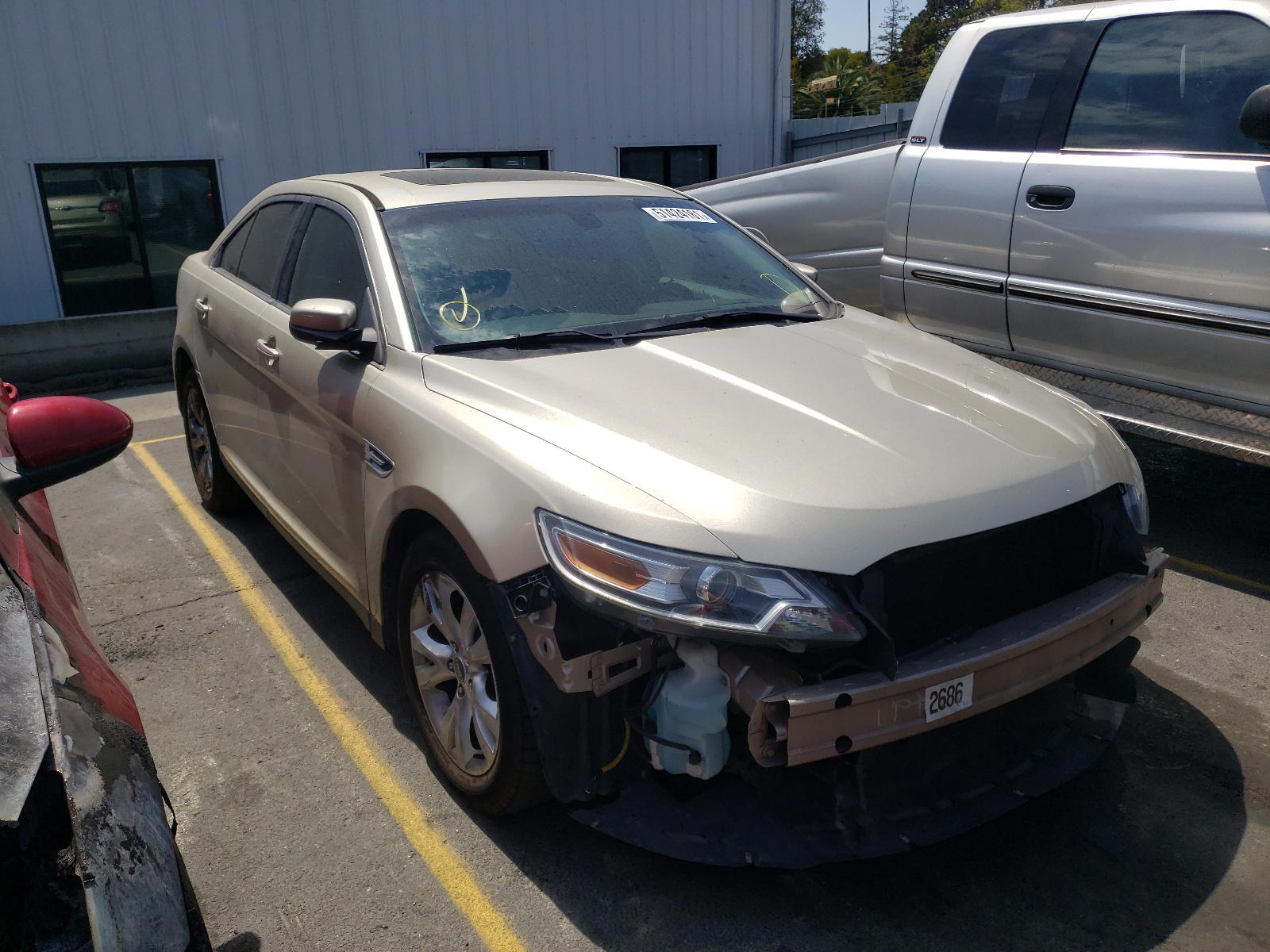 FORD TAURUS SEL 2010 with VIN 1FAHP2EW3AG150982 - Photo from auction