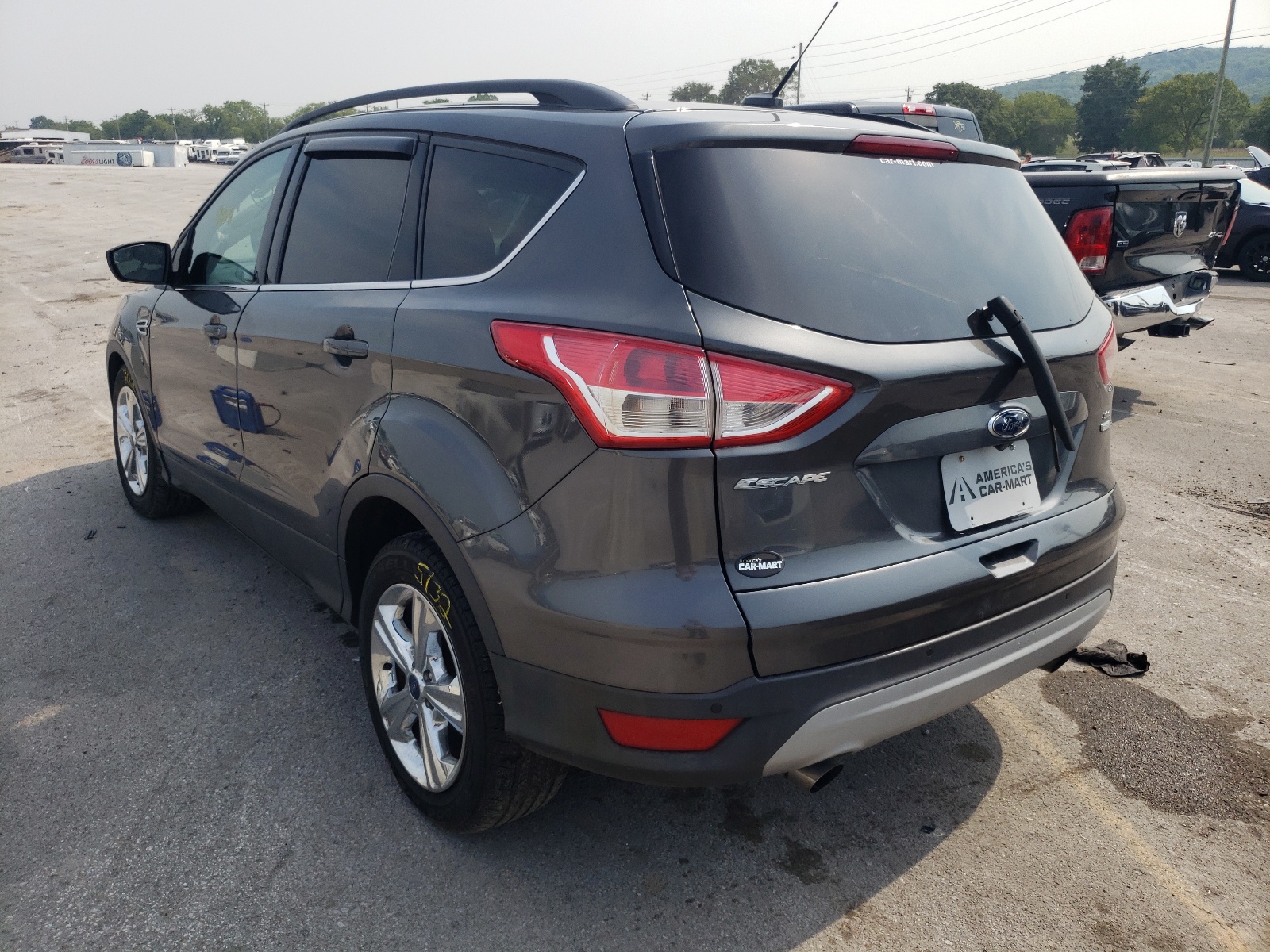 Photo 3 from auction – 2016 FORD ESCAPE SE with VIN 1FMCU9G95GUB18070