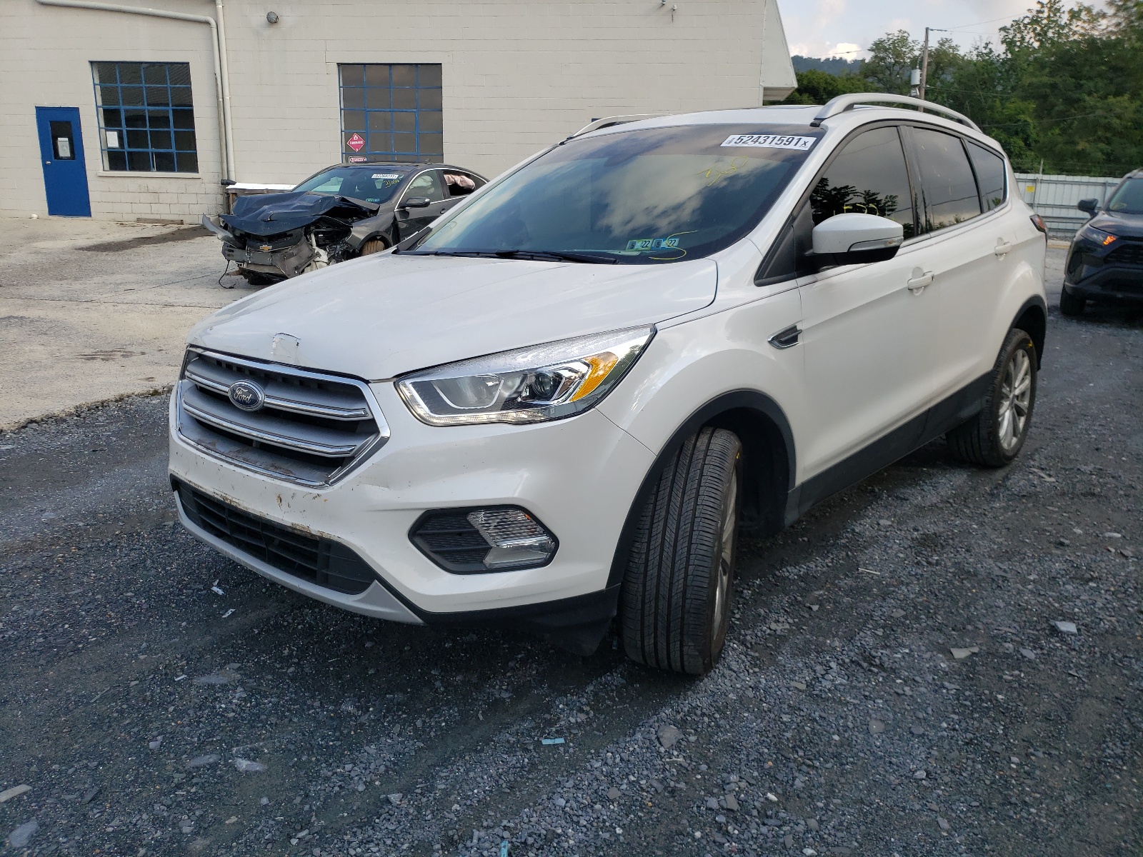 Photo 2 from auction – 2017 FORD ESCAPE TIT with VIN 1FMCU9JD4HUE83662