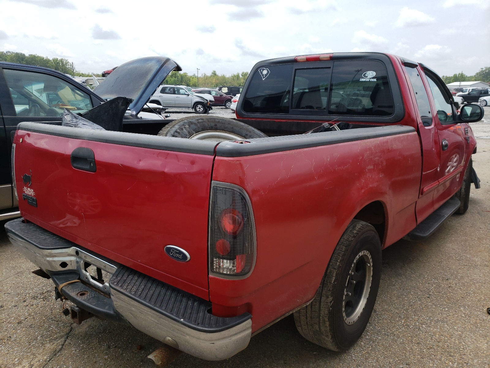 Photo 4 from auction – 2004 FORD F-150 HERI with VIN 2FTRX17W94CA13301