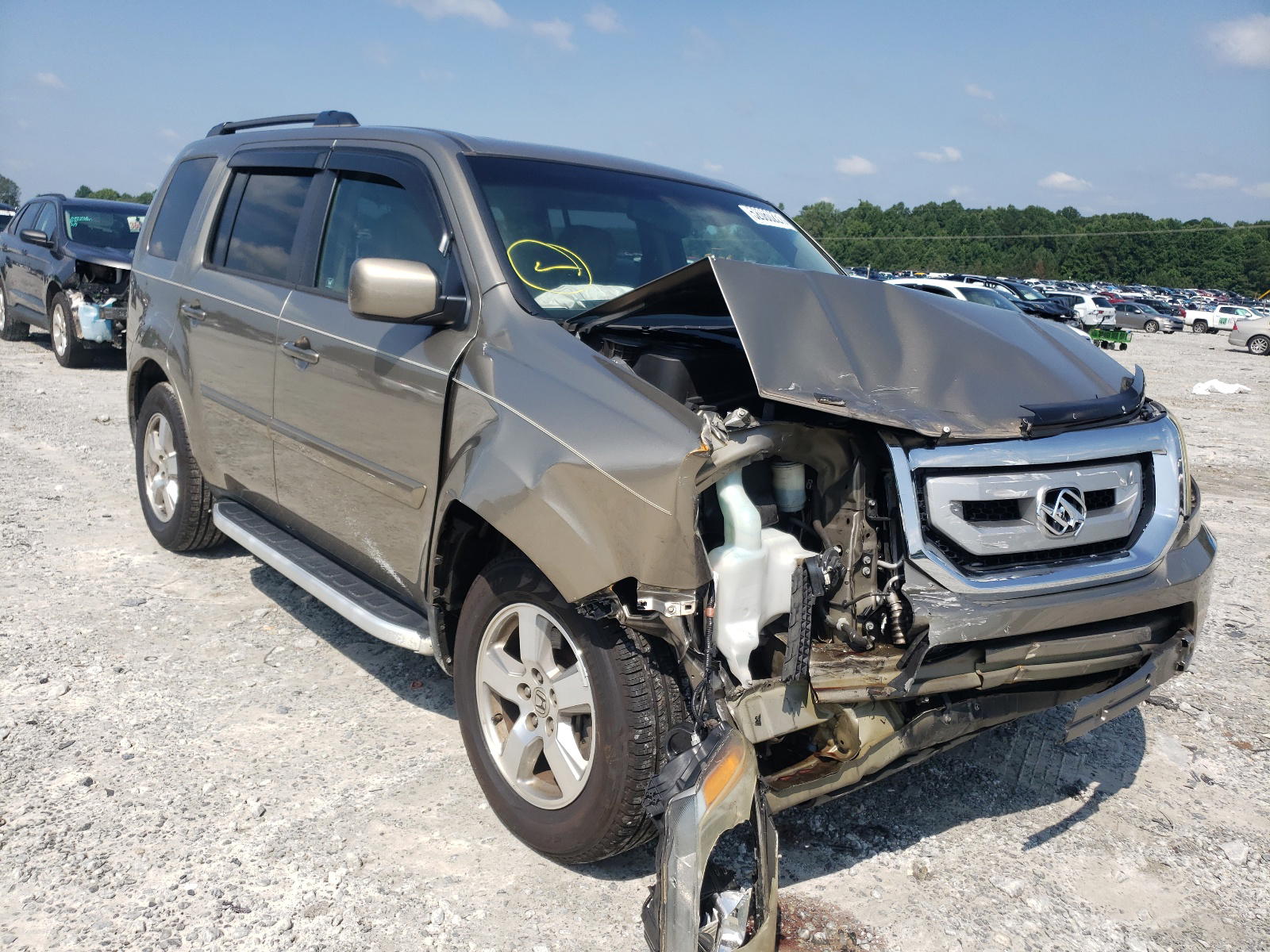 HONDA PILOT EXL 2011 with VIN 5FNYF3H6XBB038836 - Photo from auction