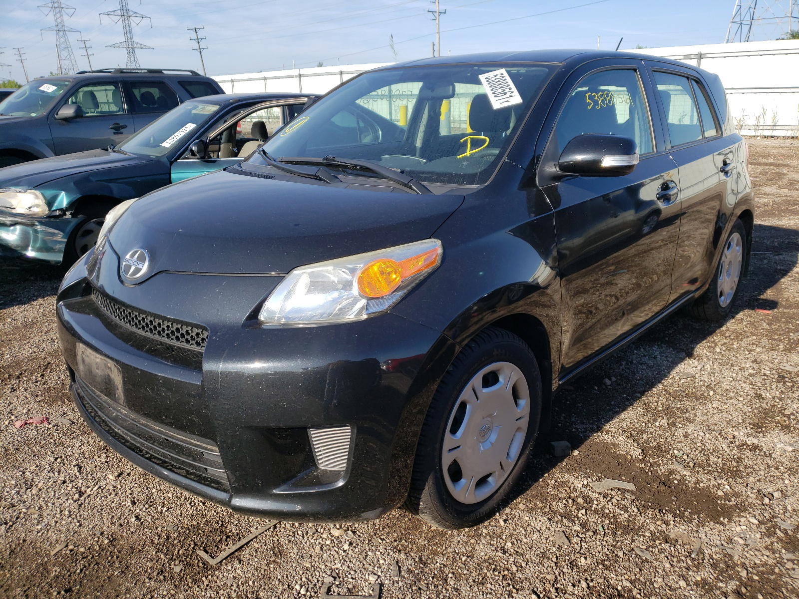 Photo 2 from auction – 2011 TOYOTA SCION XD with VIN JTKKU4B49B1015297