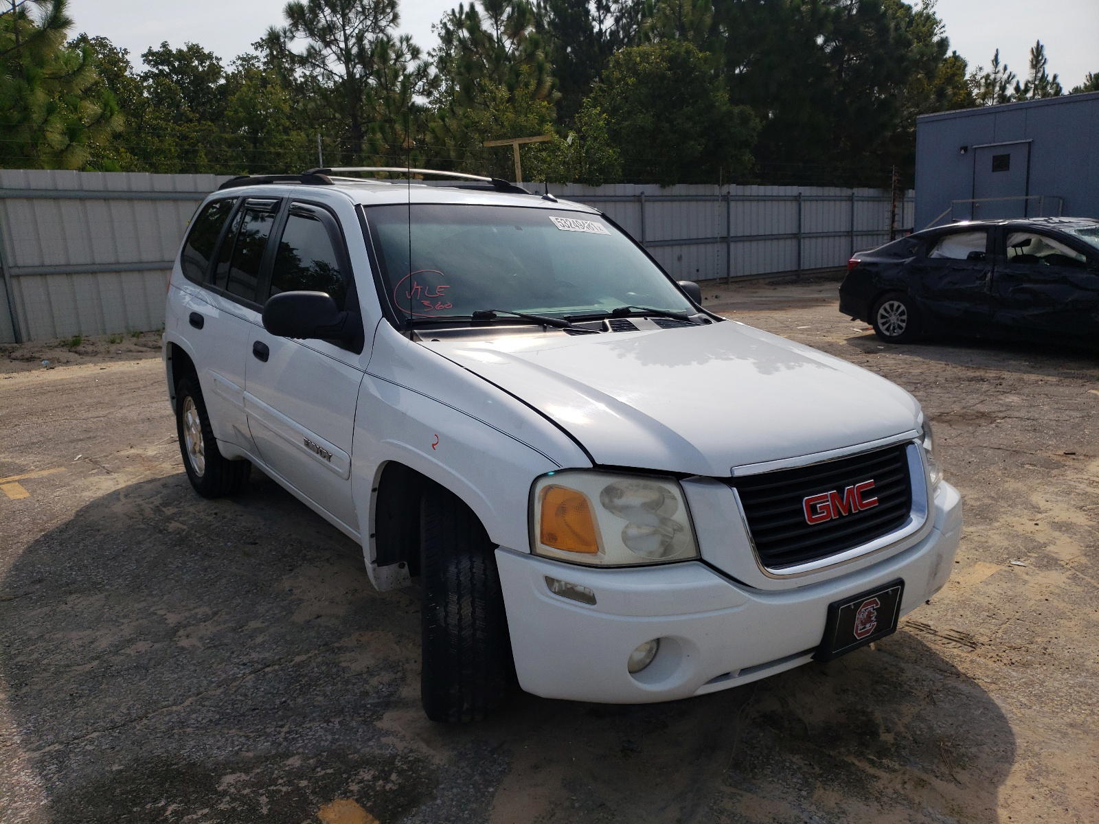 GMC ENVOY 2004 with VIN 1GKDT13SX42154063 - Photo from auction