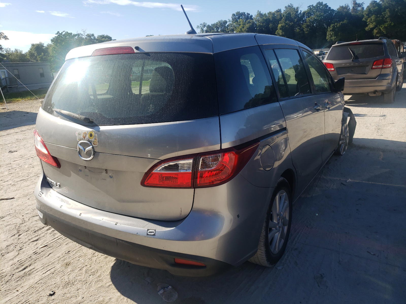 Photo 4 from auction – 2012 MAZDA 5 with VIN JM1CW2BL9C0101024