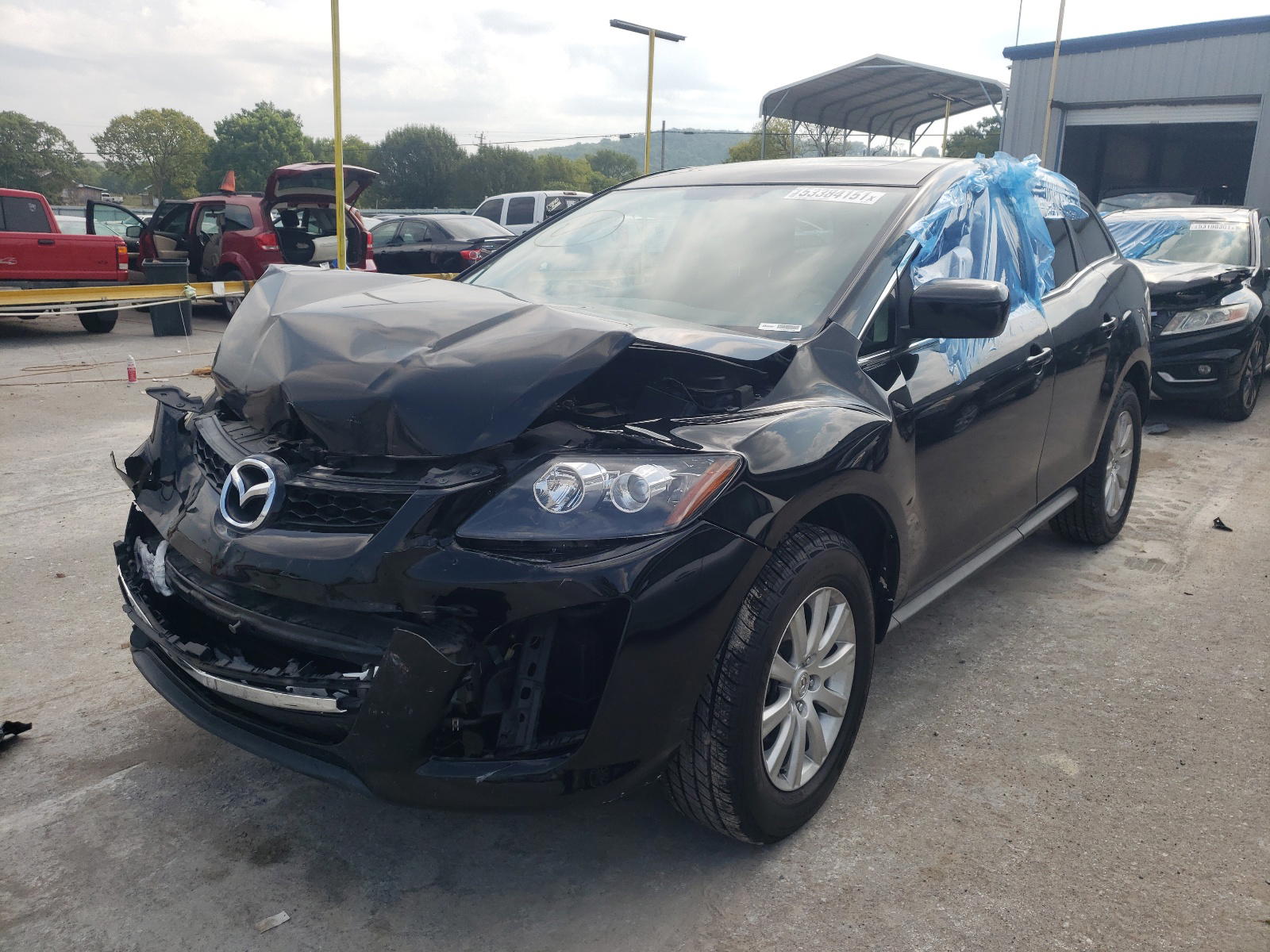 Photo 2 from auction – 2011 MAZDA CX-7 with VIN 5J6TF1H50DL001052