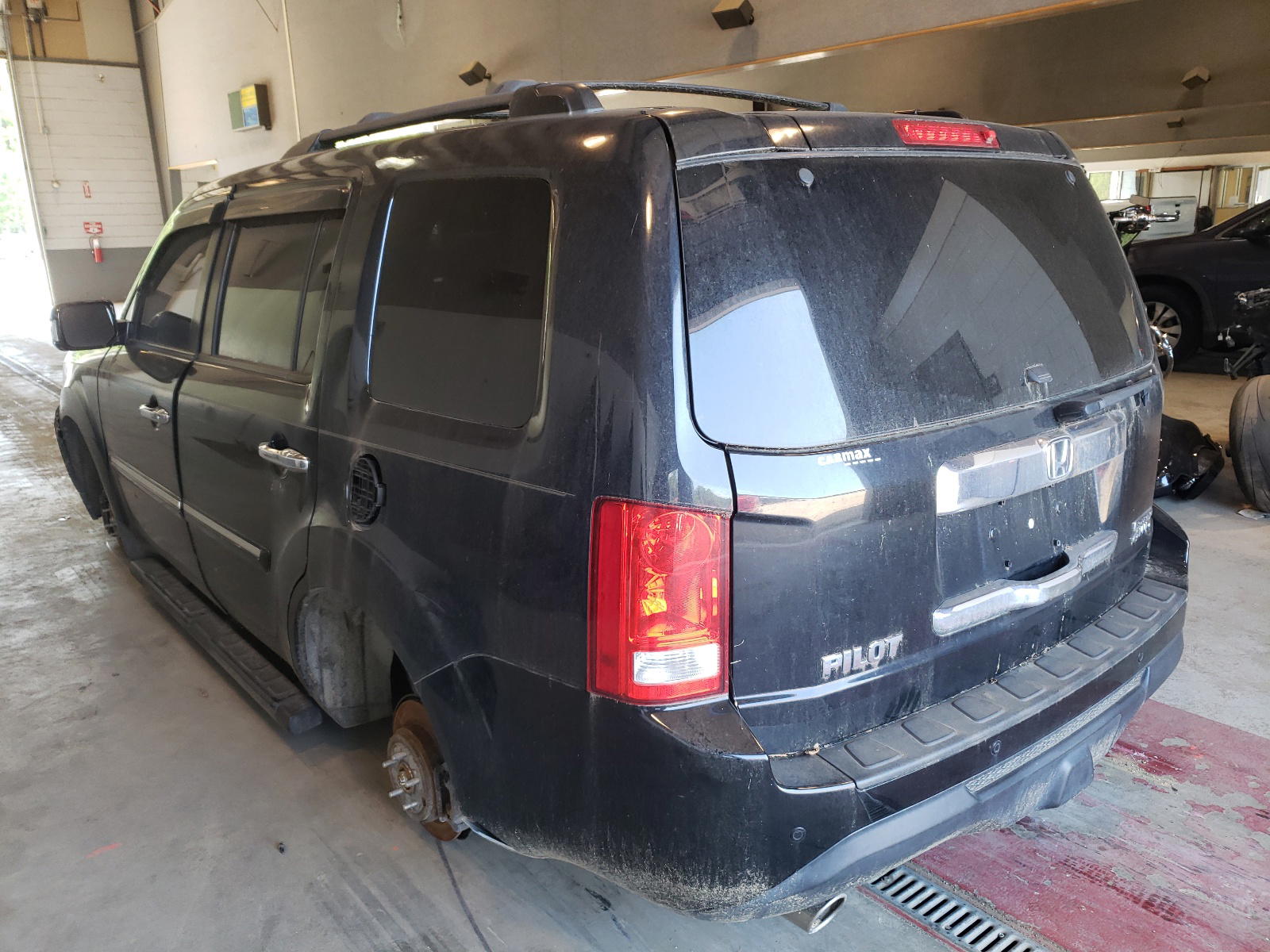 Photo 3 from auction – 2013 HONDA PILOT TOUR with VIN 5FNYF4H95DB018741