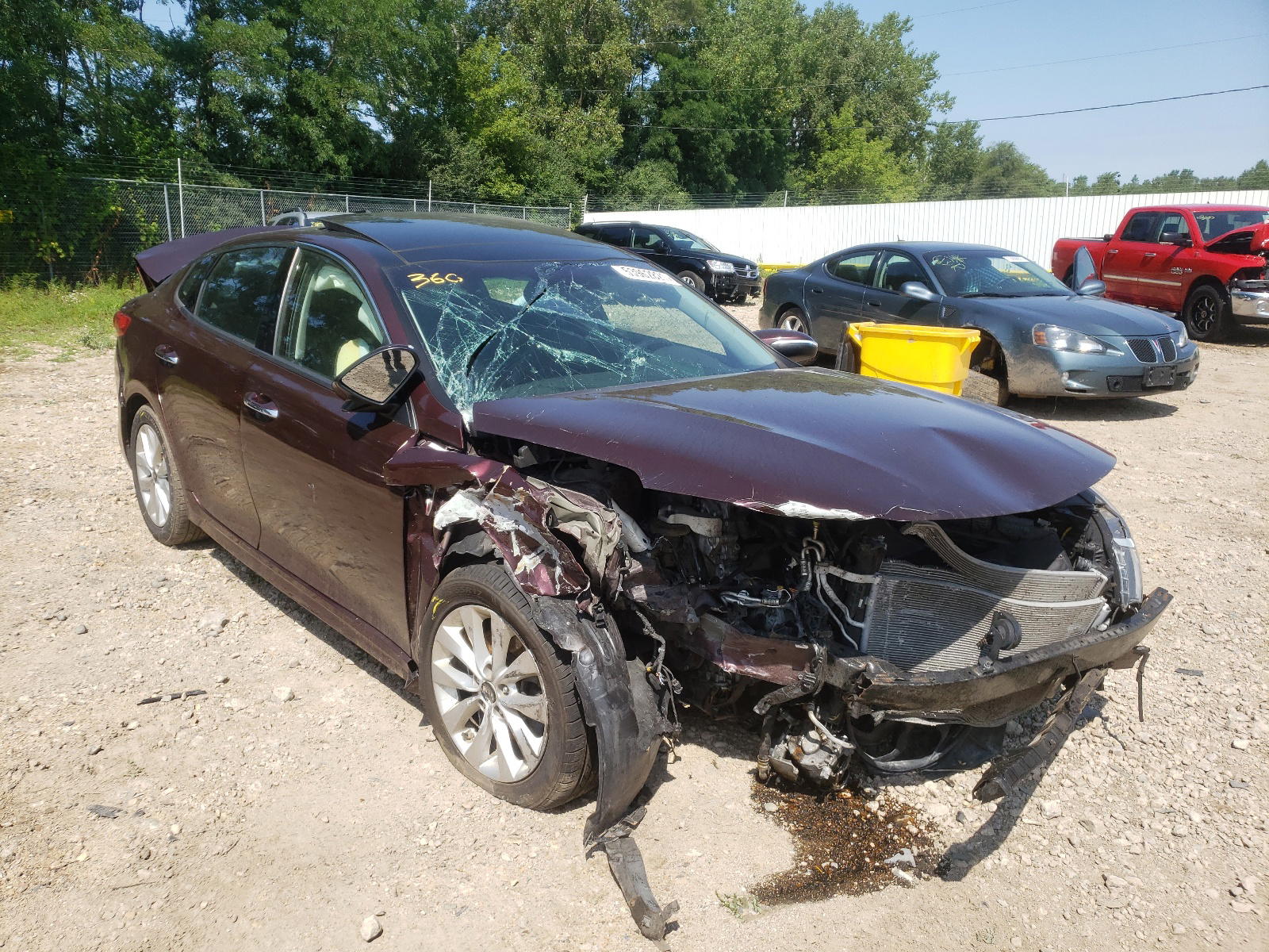 KIA OPTIMA EX 2016 with VIN 5XXGU4L37GG085458 - Photo from auction