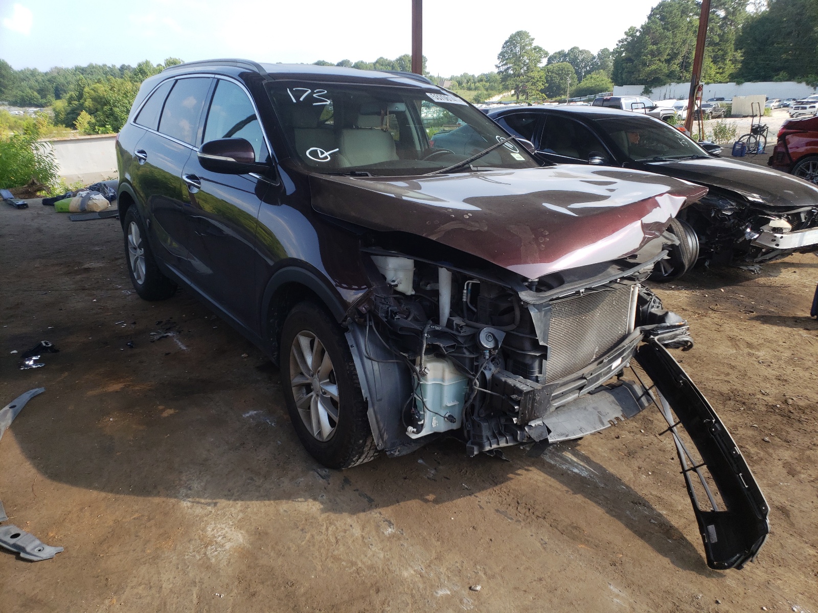 KIA SORENTO LX 2016 with VIN 5XYPG4A31GG049996 - Photo from auction