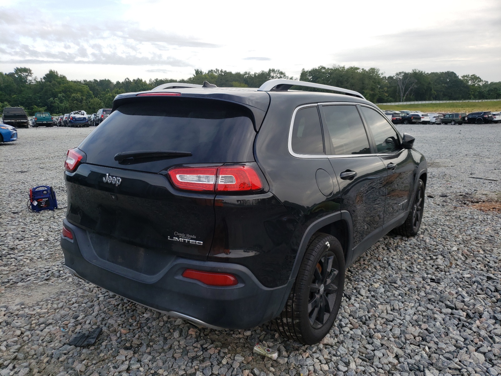 Photo 4 from auction – 2014 JEEP CHEROKEE L with VIN 1C4PJLDSXEW225880