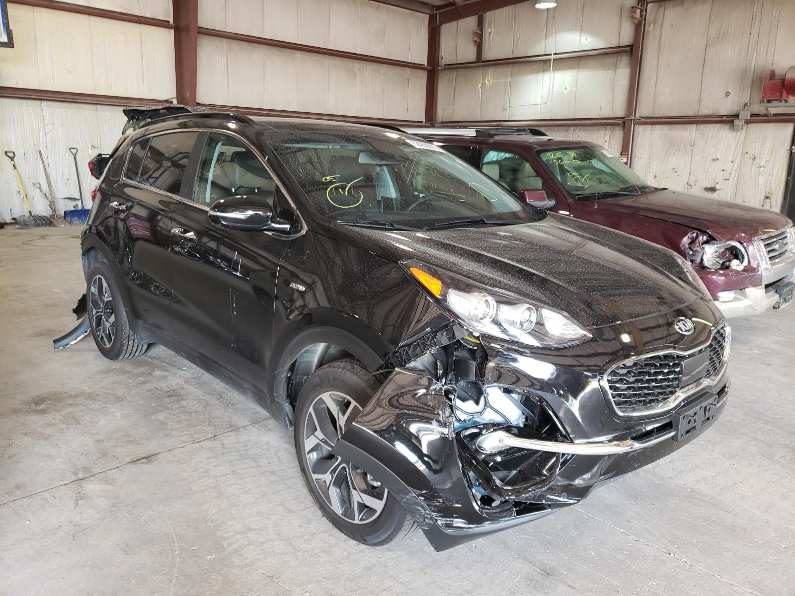 KIA SPORTAGE E 2021 with VIN KNDPNCAC3M7877508 - Photo from auction