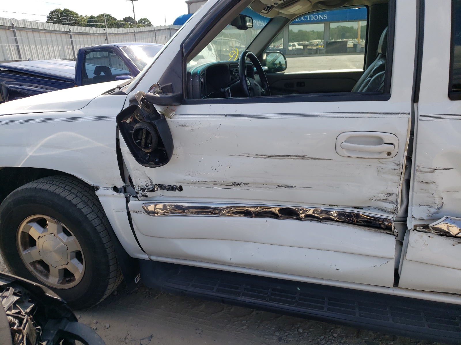 Photo 9 from auction – 2005 GMC YUKON with VIN 1GKEC13T75J200968