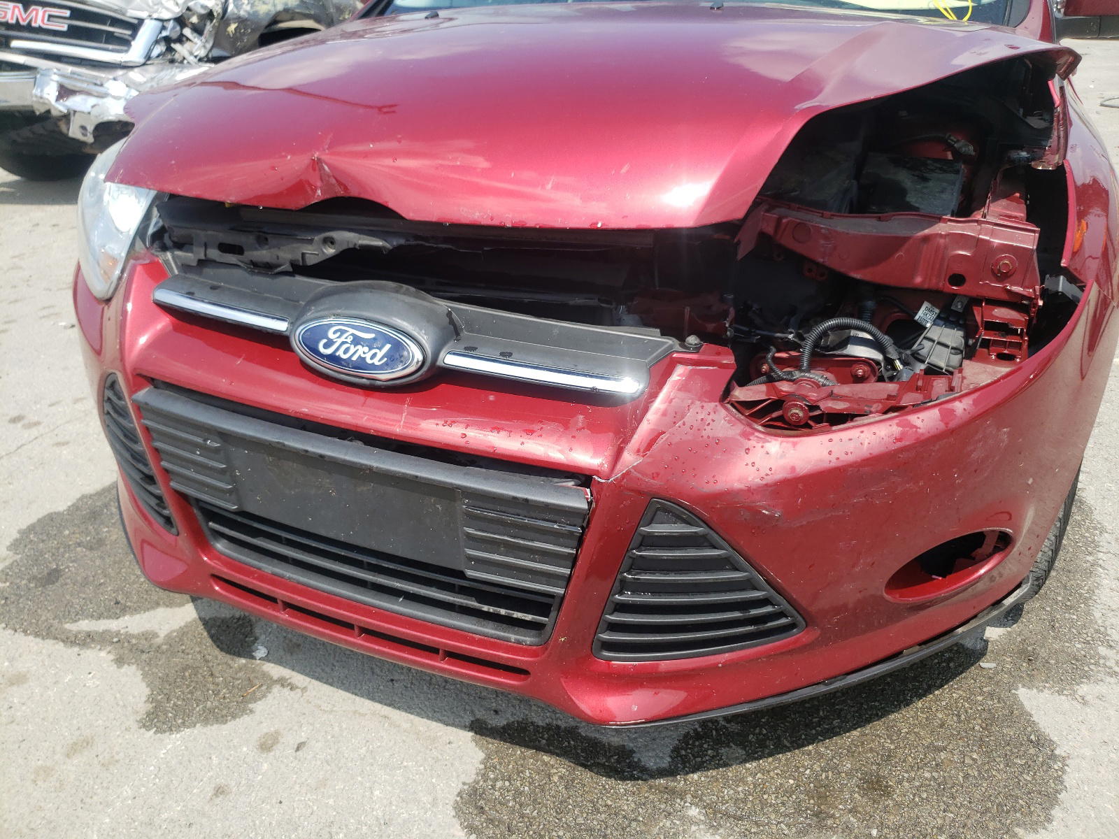 Photo 9 from auction – 2014 FORD FOCUS SE with VIN 1FADP3F20EL116477