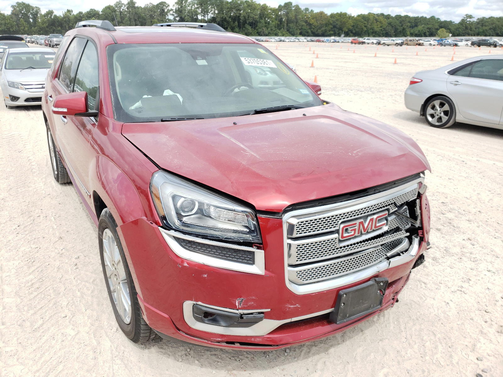 GMC ACADIA DEN 2014 with VIN 1GKKRTKD5EJ176872 - Photo from auction