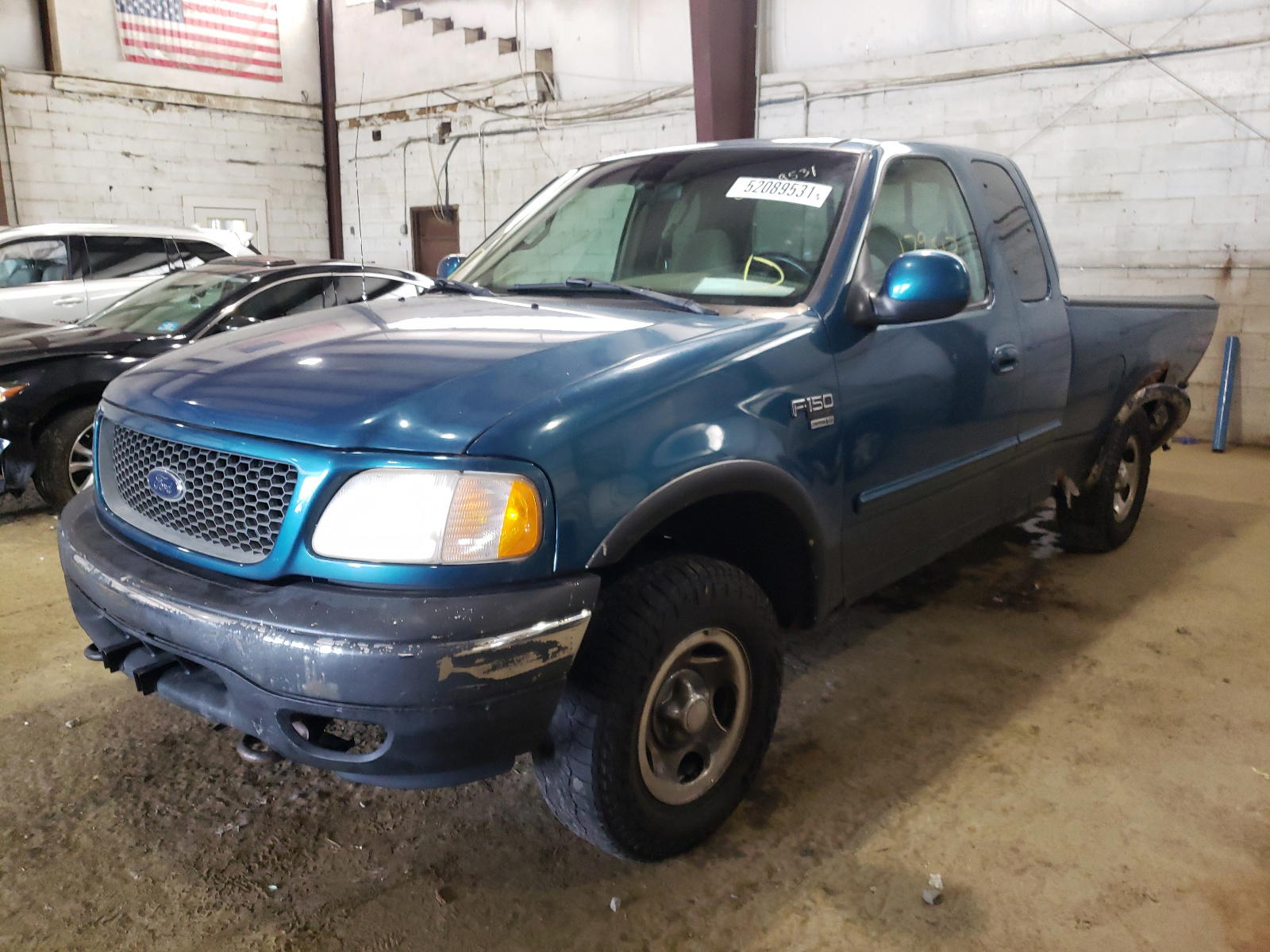 Photo 2 from auction – 2000 FORD F150 with VIN 1FTRX18LXYNA49065