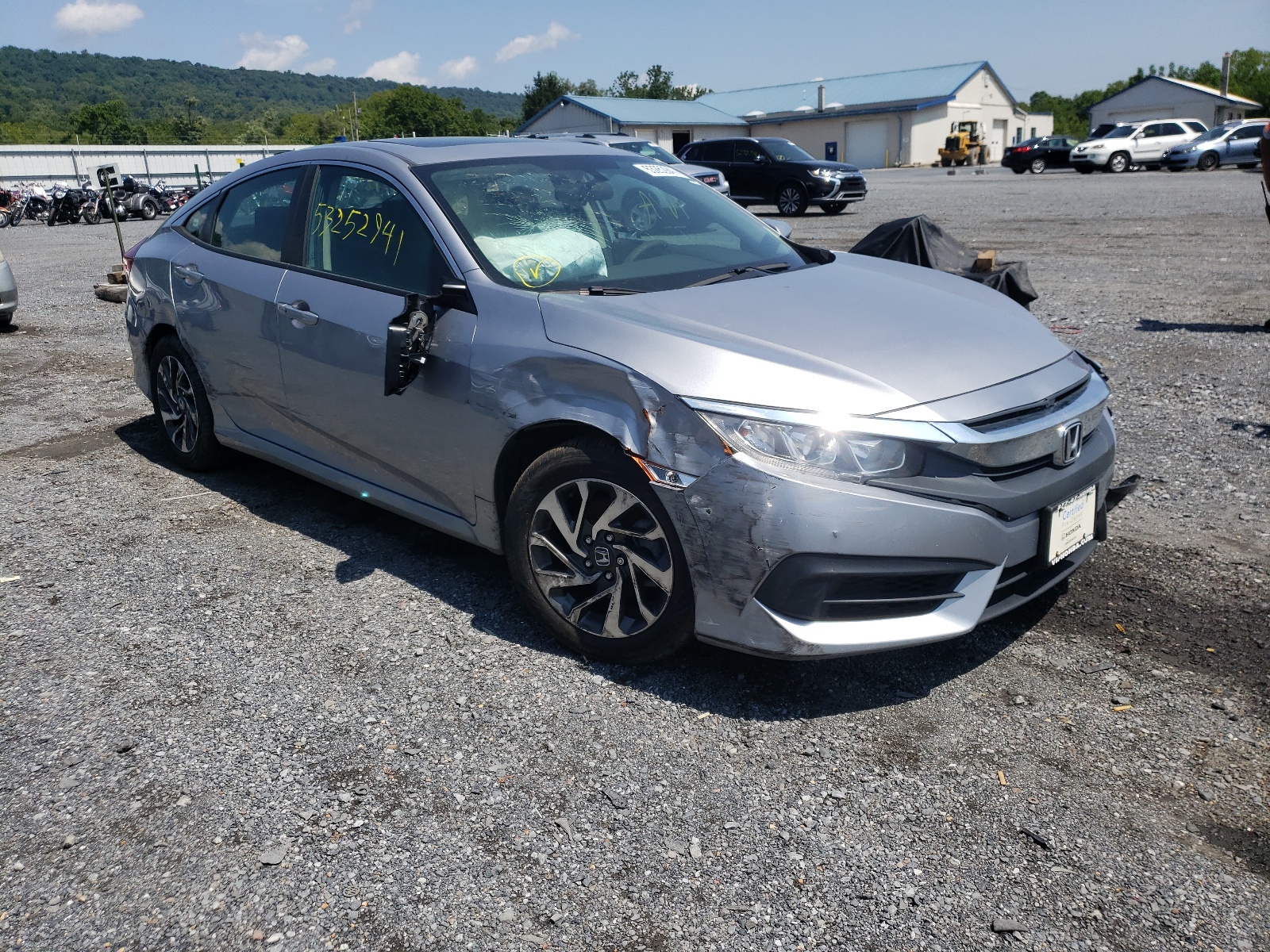 HONDA CIVIC EX 2018 with VIN 2HGFC2F7XJH530024 - Photo from auction