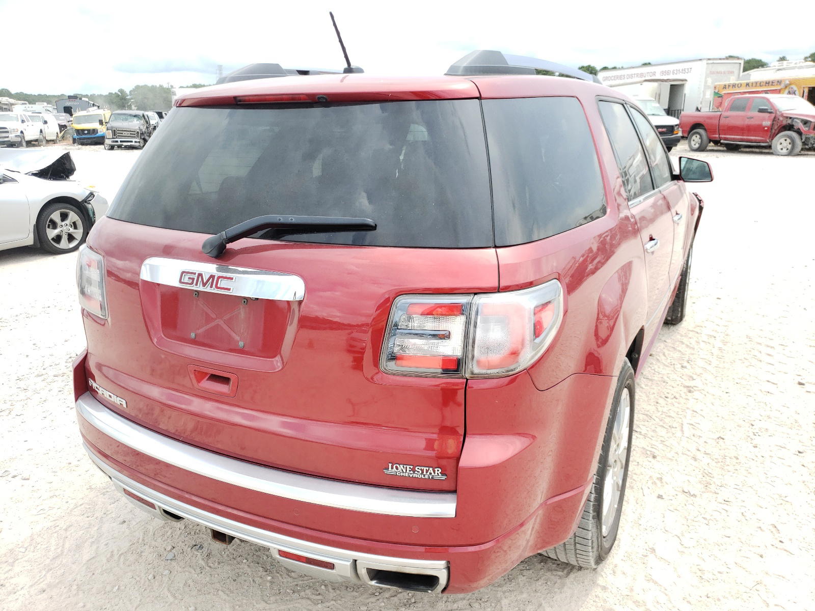 Photo 4 from auction – 2014 GMC ACADIA DEN with VIN 1GKKRTKD5EJ176872