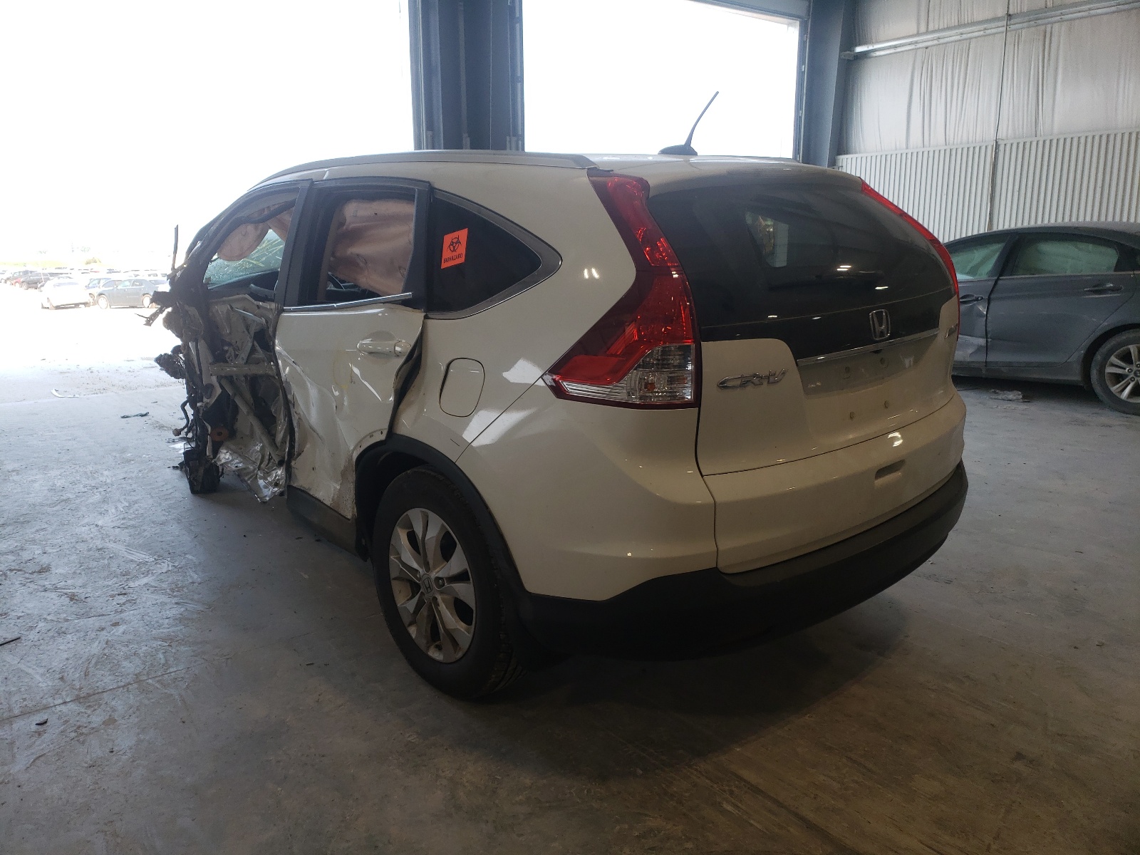Photo 3 from auction – 2013 HONDA CR-V EXL with VIN 5J6RM4H78DL019902
