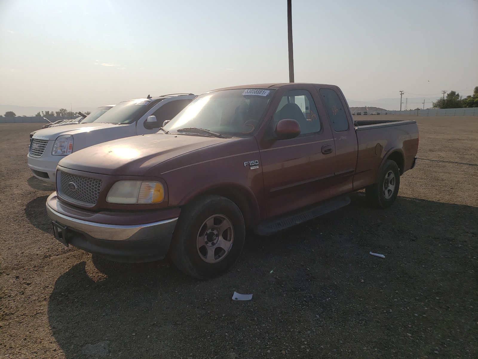 Photo 2 from auction – 1999 FORD F150 with VIN 1FTRX17L5XKB62729