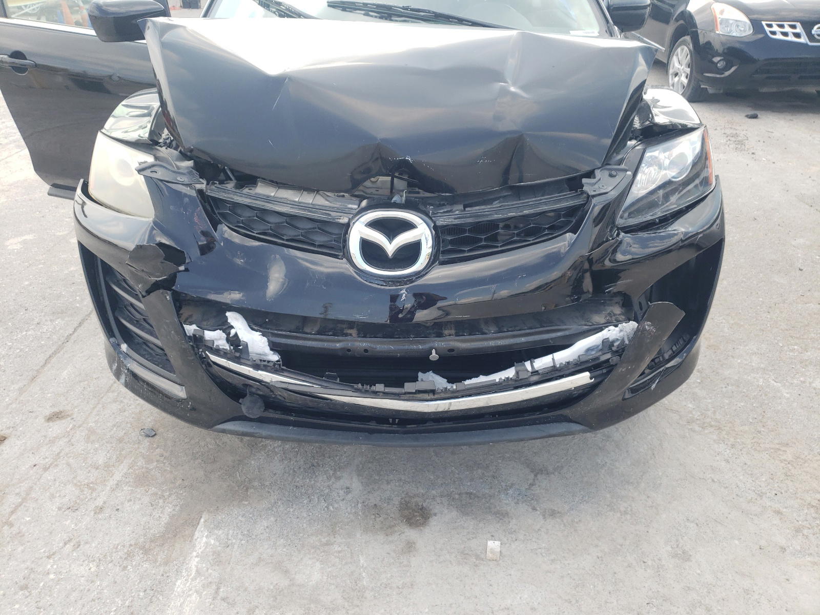 Photo 9 from auction – 2011 MAZDA CX-7 with VIN 5J6TF1H50DL001052