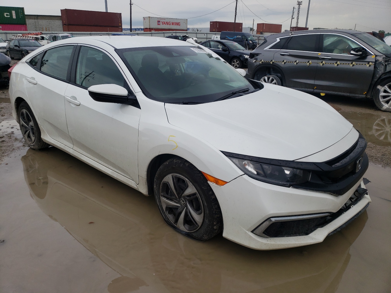 HONDA CIVIC LX 2020 with VIN 19XFC2F62LE030475 - Photo from auction