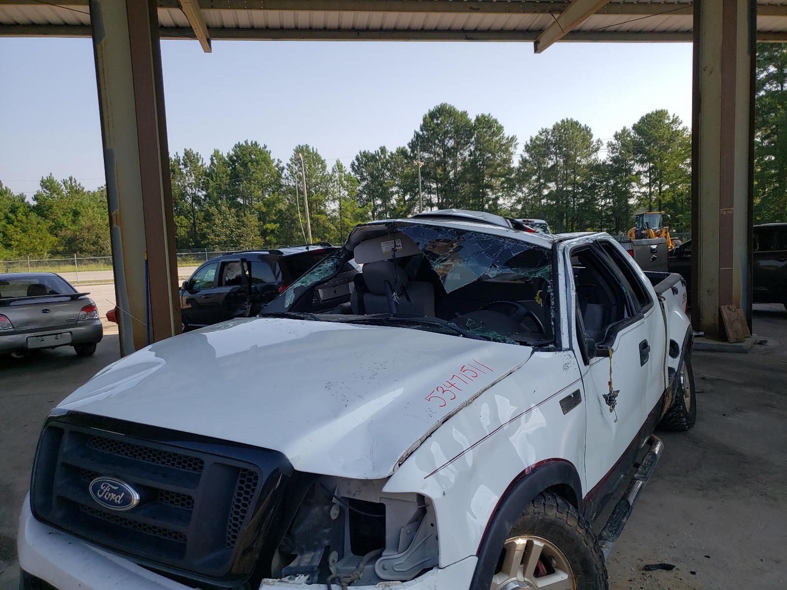 Photo 9 from auction – 2005 FORD F150 with VIN 1FTPX04535KB99654