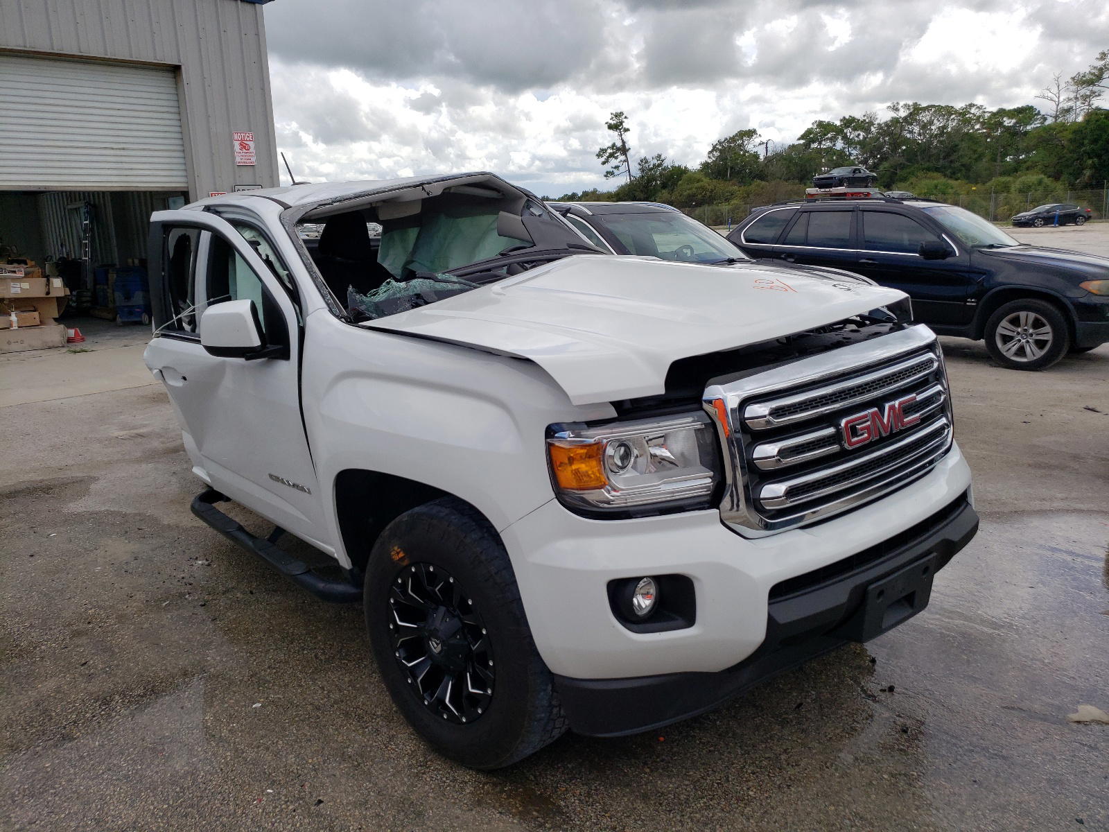 GMC CANYON SLE 2016 with VIN 1GTH5CEA3G1381015 - Photo from auction