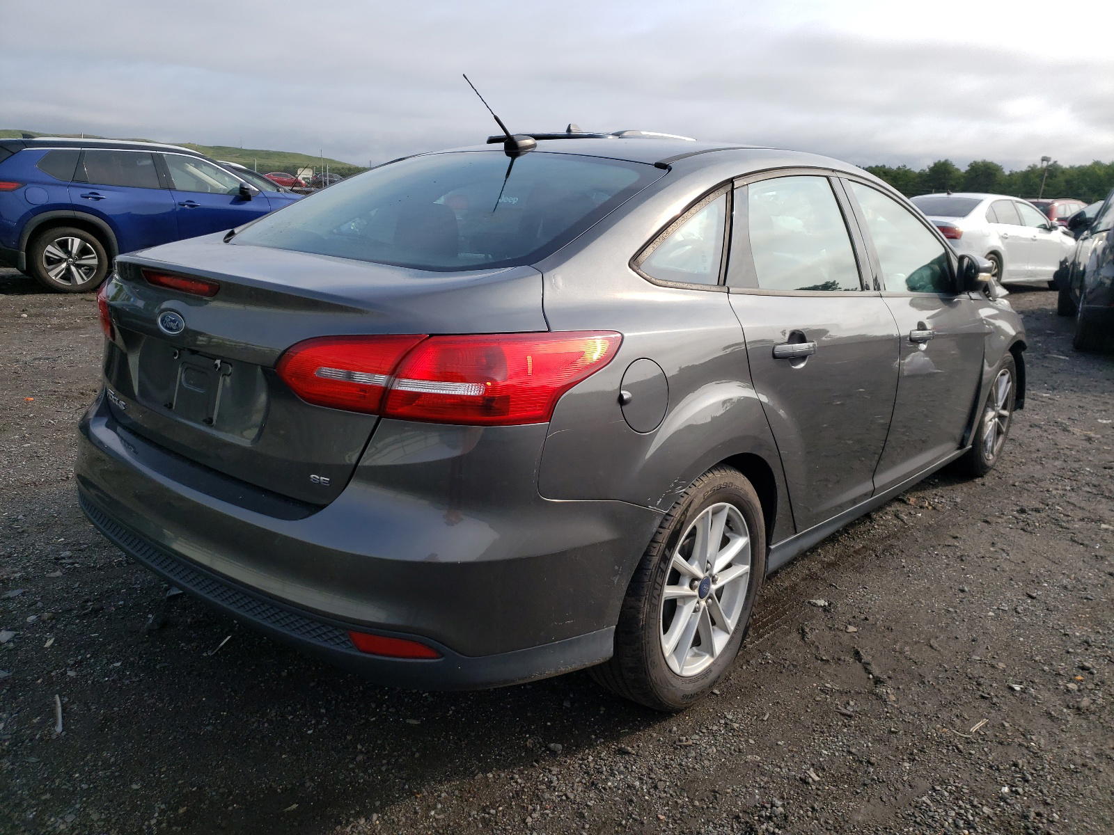 Photo 4 from auction – 2015 FORD FOCUS SE with VIN 1FADP3F24FL259997