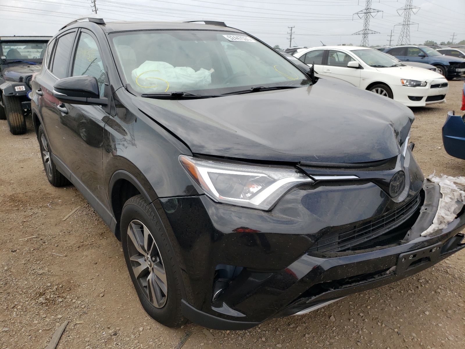 Photo 1 from auction – 2016 TOYOTA RAV4 XLE with VIN 2T3RFREV5GW443376