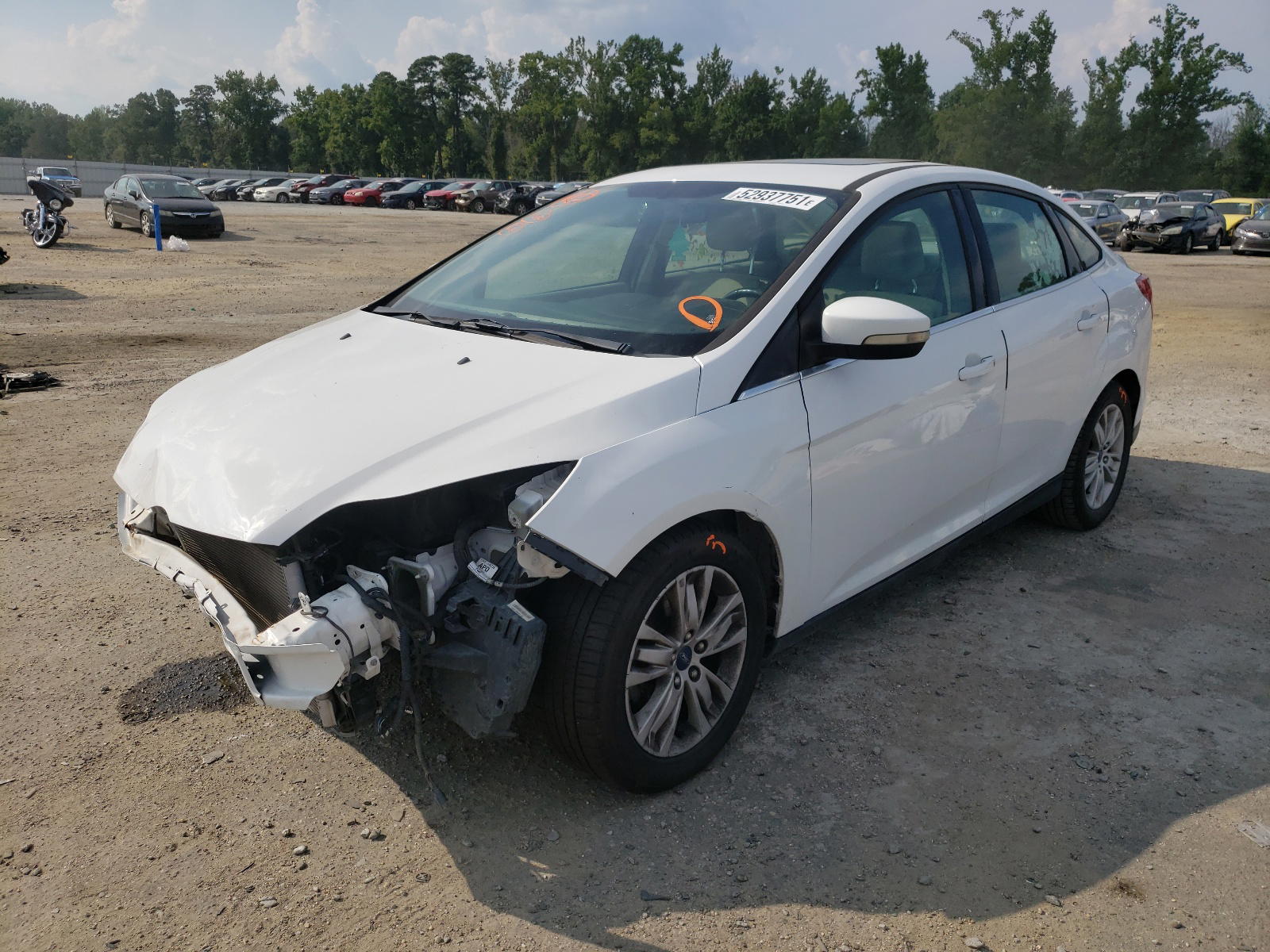 Photo 2 from auction – 2012 FORD FOCUS SEL with VIN 1FAHP3H22CL344525