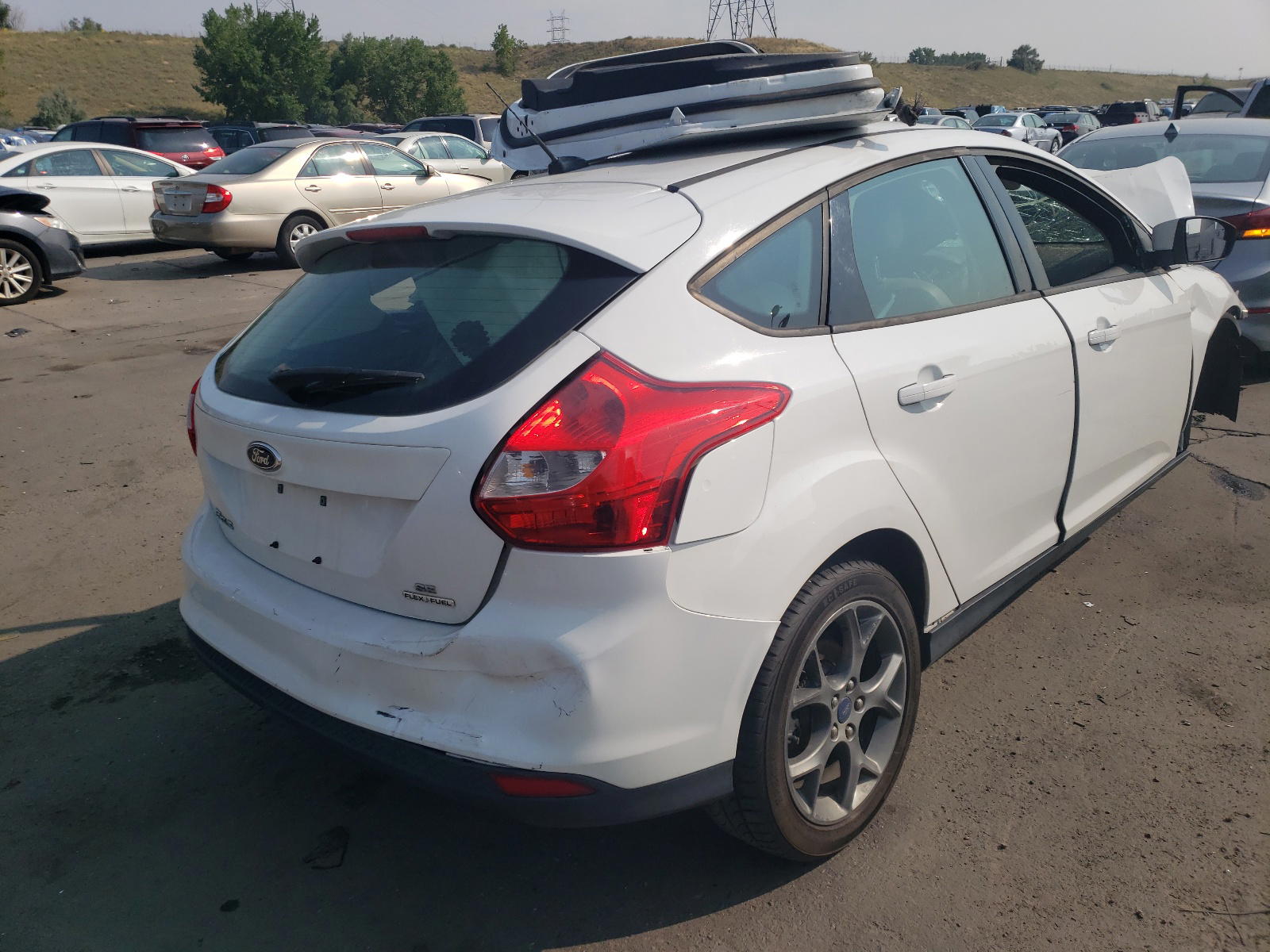 Photo 4 from auction – 2013 FORD FOCUS SE with VIN 1FADP3K29DL152687